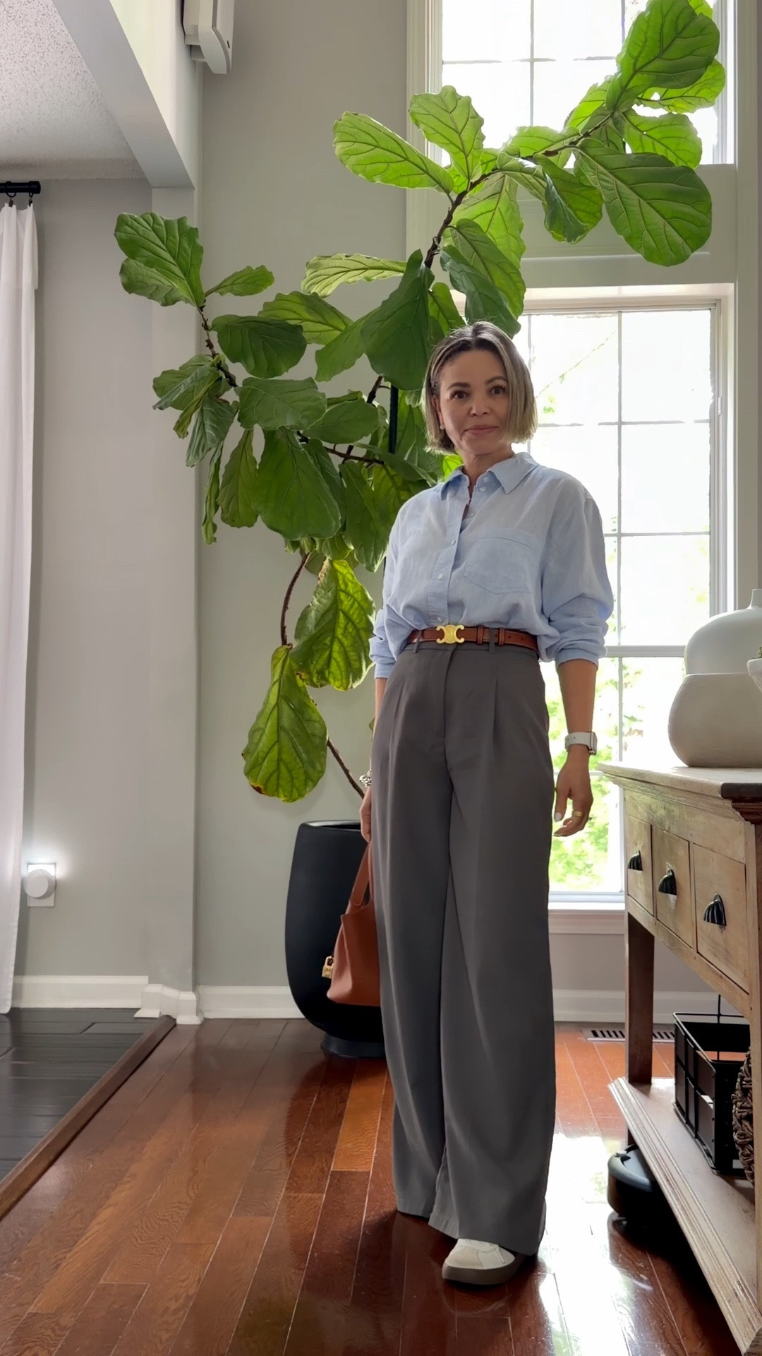 Work outfits are all about comfort and style. For a chic look, pair a baby blue linen shirt with high-waisted gray trousers. Add a tan belt and bag to complete the ensemble, and don’t forget the sneakers for added comfort! 

#workwear #Outfit #spring #over50 #ootd

#LTKgrwm #LTKPetite #LTKOver40