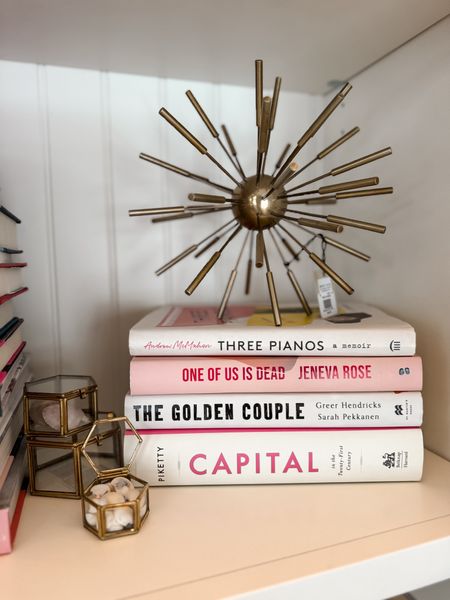 Bookshelf, decor and bookcase styling shelf, gold glass, shadowboxes nesting boxes, decor, and gold sputnik decorative object from West Elm pink books