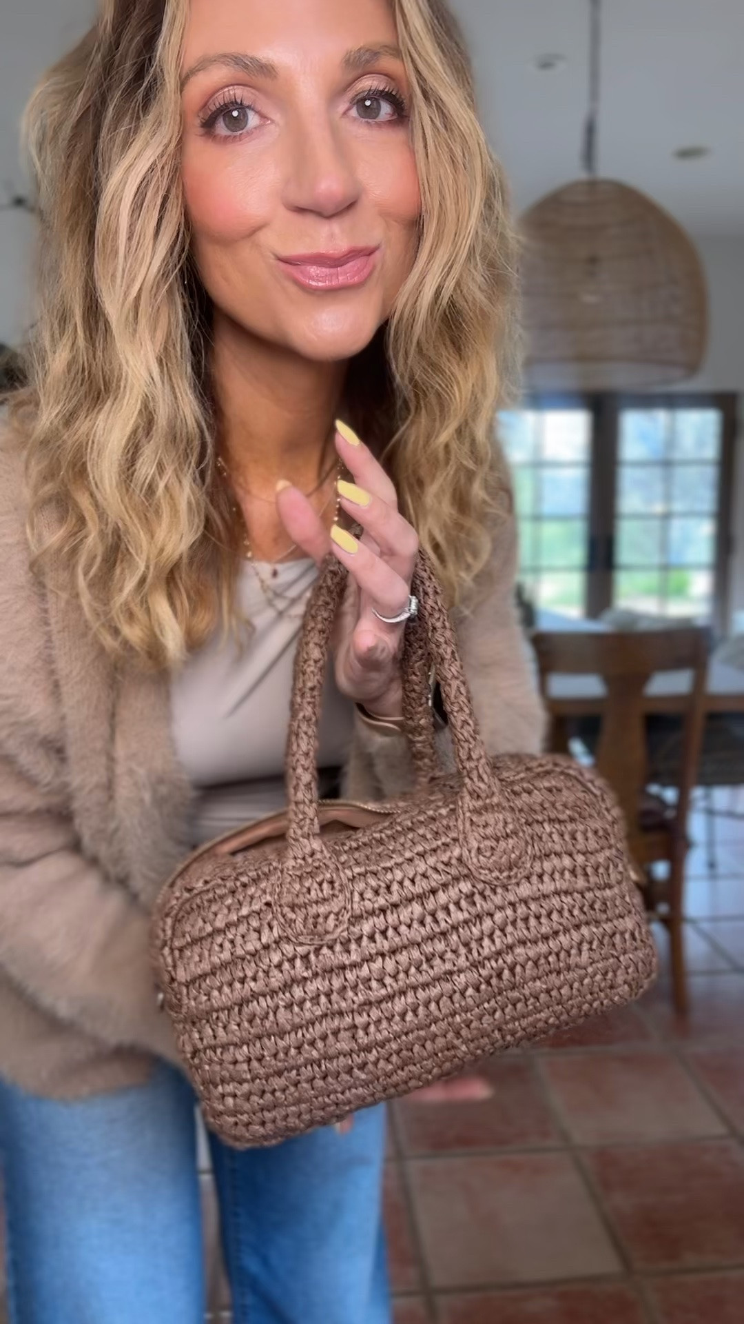 This chocolate brown woven bag from @Target is one of those pieces that instantly makes every outfit feel more elevated 🤎 The woven texture, gold zipper details, and structured shape make it look so much more expensive than it is. It holds SO much too. I always keep a little zippered pouch inside my bags with all my smaller essentials so I can easily transfer everything from bag to bag, and this one still fits that plus my phone, keys, sunglasses, and even a small water bottle.

I love that the woven straw material has a little stretch to it while still holding its shape beautifully. It also comes with a crossbody strap which makes it perfect for everyday errands, travel days, vacation outfits, beach dinners, casual summer outfits, and even date night. Such a good neutral bag that goes with linen sets, denim, dresses, and resort wear looks.

Linked this bag plus some other Target favorites I’ve been loving lately ✨

#LTKootd #LTKgrwm #LTKSwim