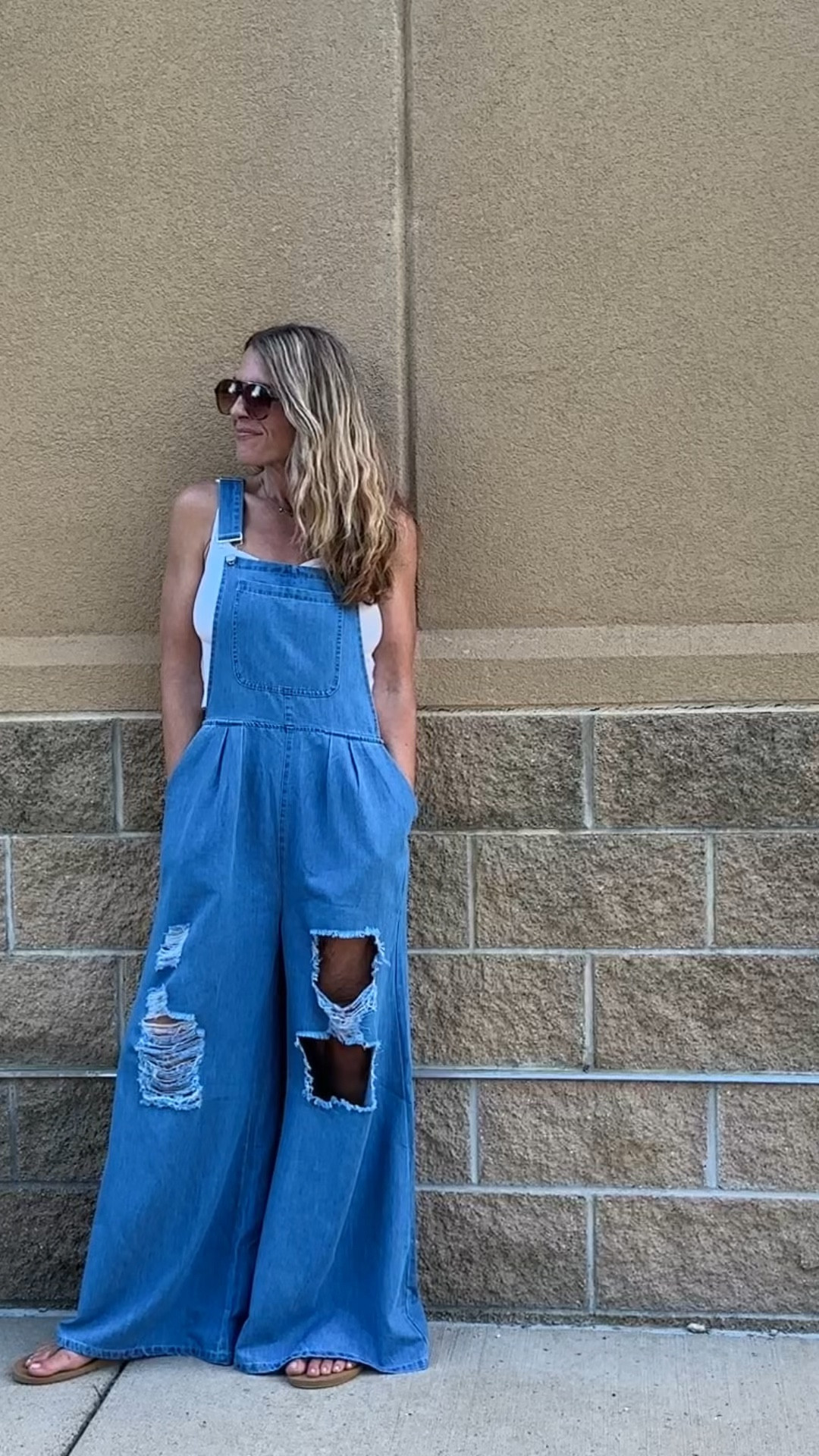 Boho distressed overalls, I LOVE THEM! They are long, the waist is stretchy, and the rinse is perfect! 

Dress these down with flip flops or up with some cute wedges. 

Wear To: 
Country Concert 🤠
Farmer's Market 🌽
Summer BBQ 🍗
Baseball Game ⚾️

#LTKMidsize #LTKOver40 #LTKStyleTip

#LTKFindsUnder50 #LTKFindsUnder100