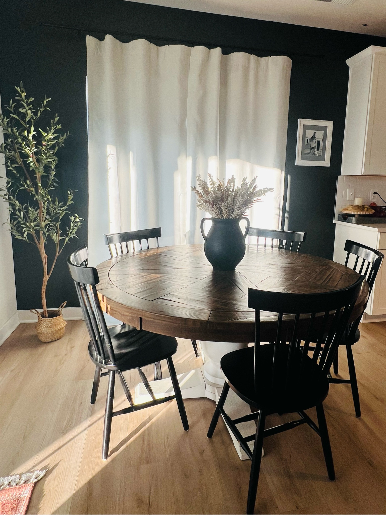 My table is called the Grindleburg from Ashley Furniture. Looks like they may have stopped making it! Here are two other very similar ones as well as my chairs! 

#LTKHome