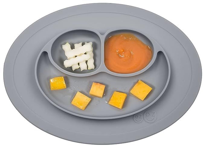 ezpz Mini Mat - 100% Silicone Suction Plate with Built-in Placemat for Infants + Toddlers - First... | Amazon (US)