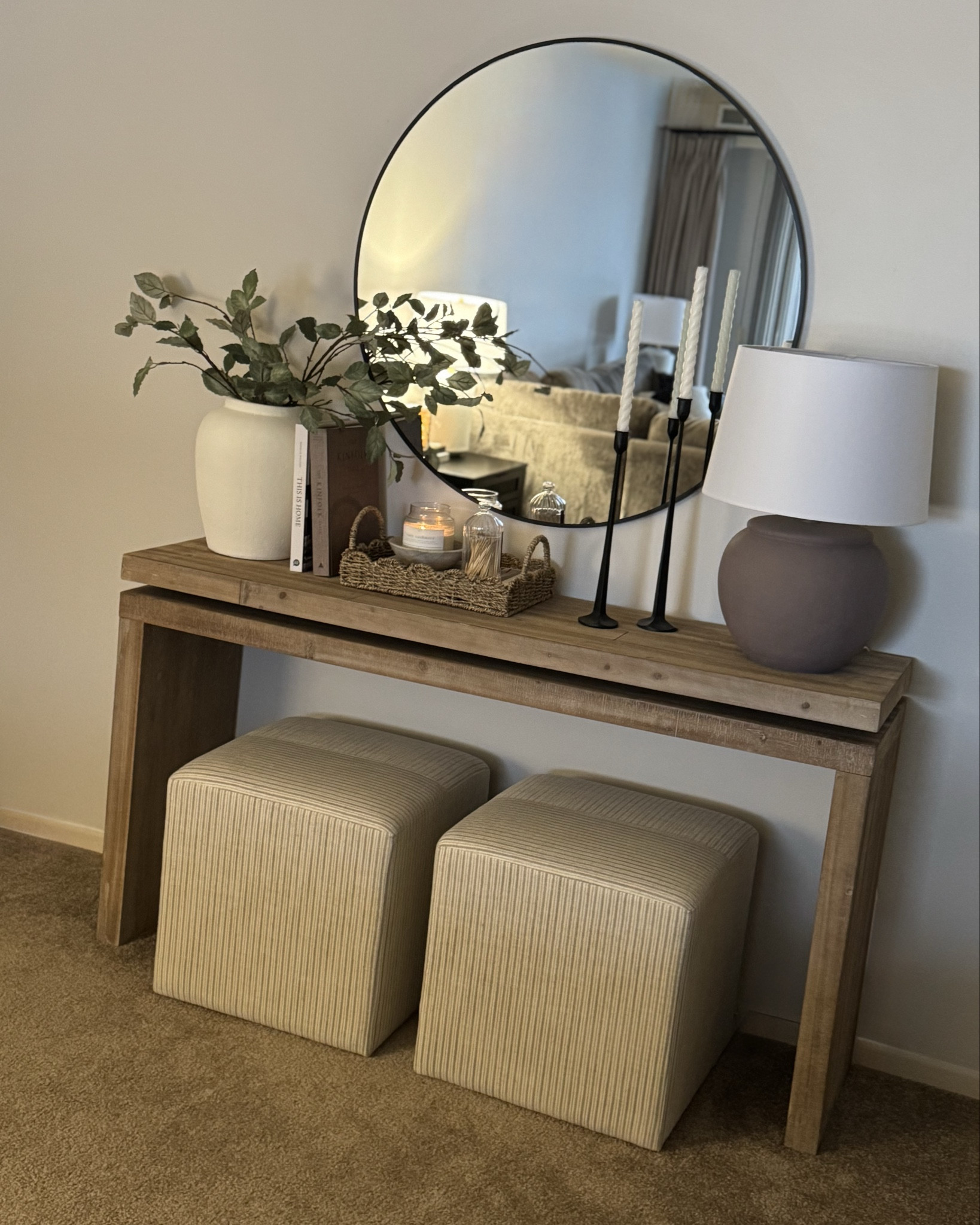 Console table, wood console table, stripe Ottomans, entryway, cream, vase, iron, candlesticks, round mirror, scallop tray, candle bowl, spring decor

#LTKSeasonal #LTKHome #LTKSaleAlert