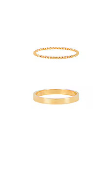 petit moments Stacker Thin Rings in Gold from Revolve.com | Revolve Clothing (Global)