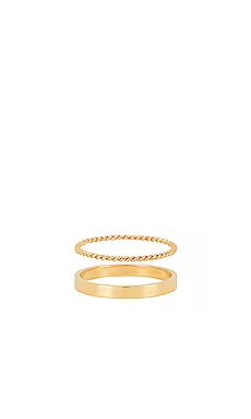 petit moments Stacker Thin Rings in Gold from Revolve.com | Revolve Clothing (Global)