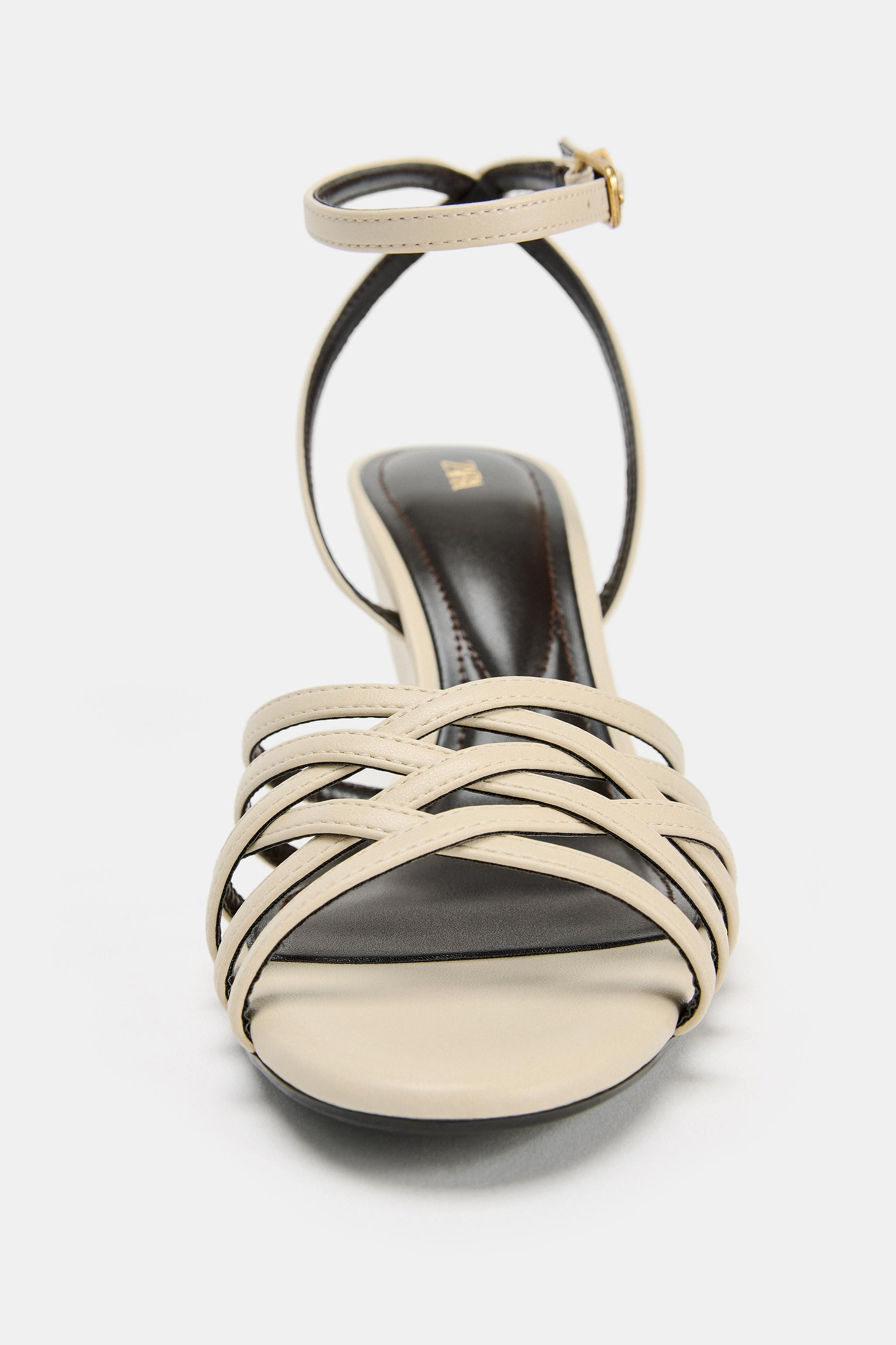 Heeled sandals. Crisscross straps at the front. High wedge heel. Ankle strap closure with metalli... | Zara US