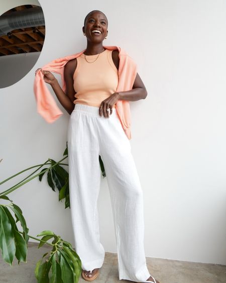 Affordable Spring outfit from Old Navy. orange tank with coordinated sweatshirt, white linen pants, white faux leather flip flops. Great travel look! 


#LTKtravel #LTKfindsunder100 #LTKfindsunder50