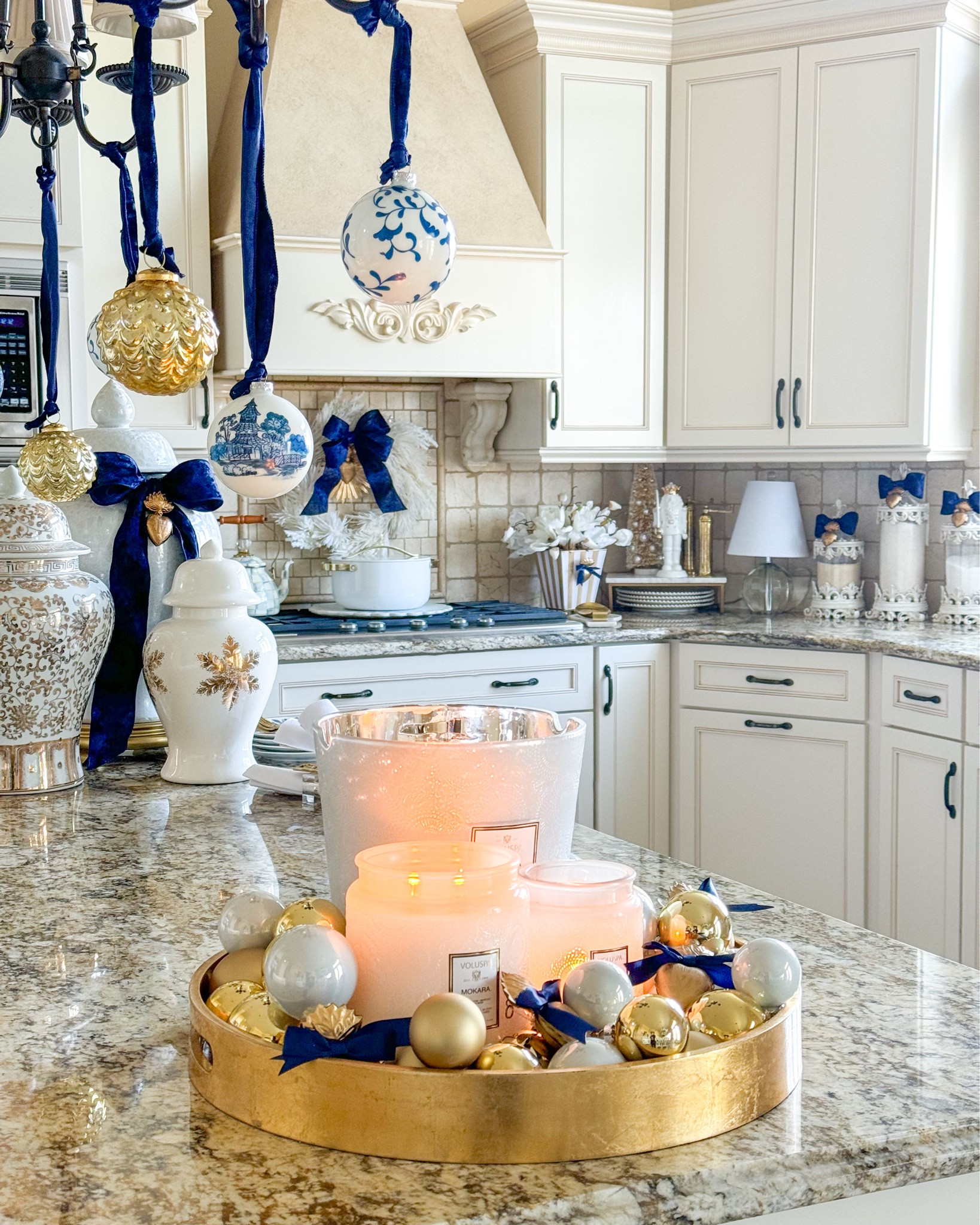 Shop my navy blue, white and gold Christmas kitchen!

Voluspa, mokara, Christmas kitchen decor, chinoiserie ornaments, gold ginger jar, Williams Sonoma, caraway home, white and gold nutcracker,
Gold tray, gold ornaments

#LTKFindsUnder100 #LTKSeasonal #LTKHome