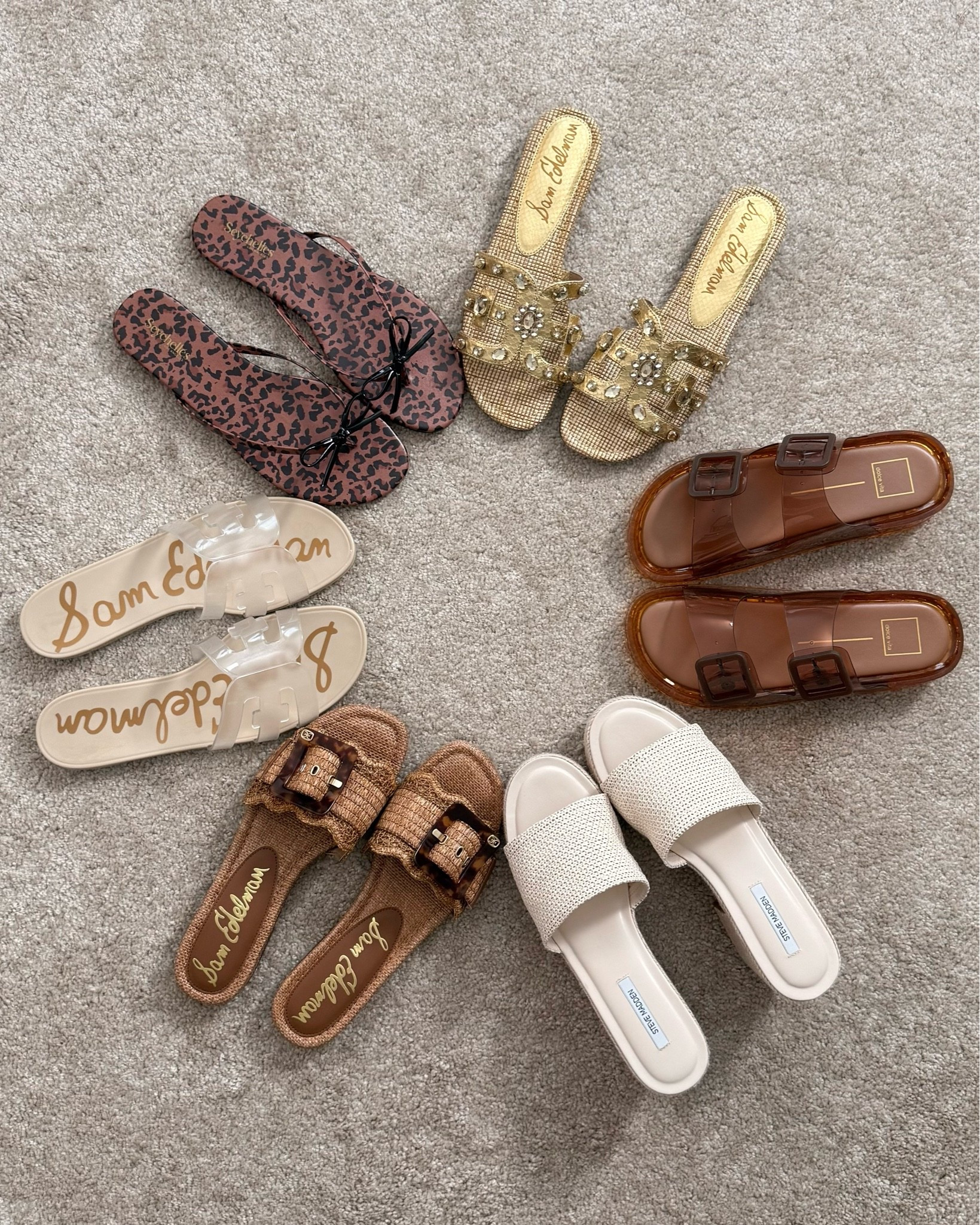 The sandal haul has officially landed. 👡✨

A few days ago I shared the pairs that sent me down a summer sandal rabbit hole… and now they’re here.

The white jellies disappeared almost immediately because my daughter claimed them for herself so I’ve added my Steve Madden Trippy sandals to the roster 😂

Current favorites are the raffia slides and the whiskey resin pair but I have a feeling all of these are about to get plenty of wear this summer.

Tell me your pick:
🤎 Raffia
🫧 Clear Jellies
🐆 Leopard
✨ Sparkle
🥃 Whiskey jellies
🤍 Trippy Sandals

And yes…I still maintain that a girl can never have too many summer sandals. 😌

#LTKSeasonal #LTKStyleTip #SummerStyle #SummerSandals #LTKOver40 #Over40Style #BeccaFritzStyle