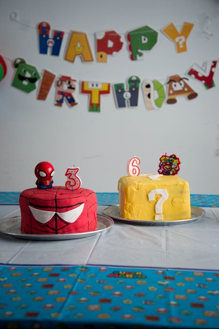 A combination birthday party for a three year old and six year old, with Super Mario theme cake and decor and Spider Man cake  

#LTKparties #LTKkids #LTKfindsunder50