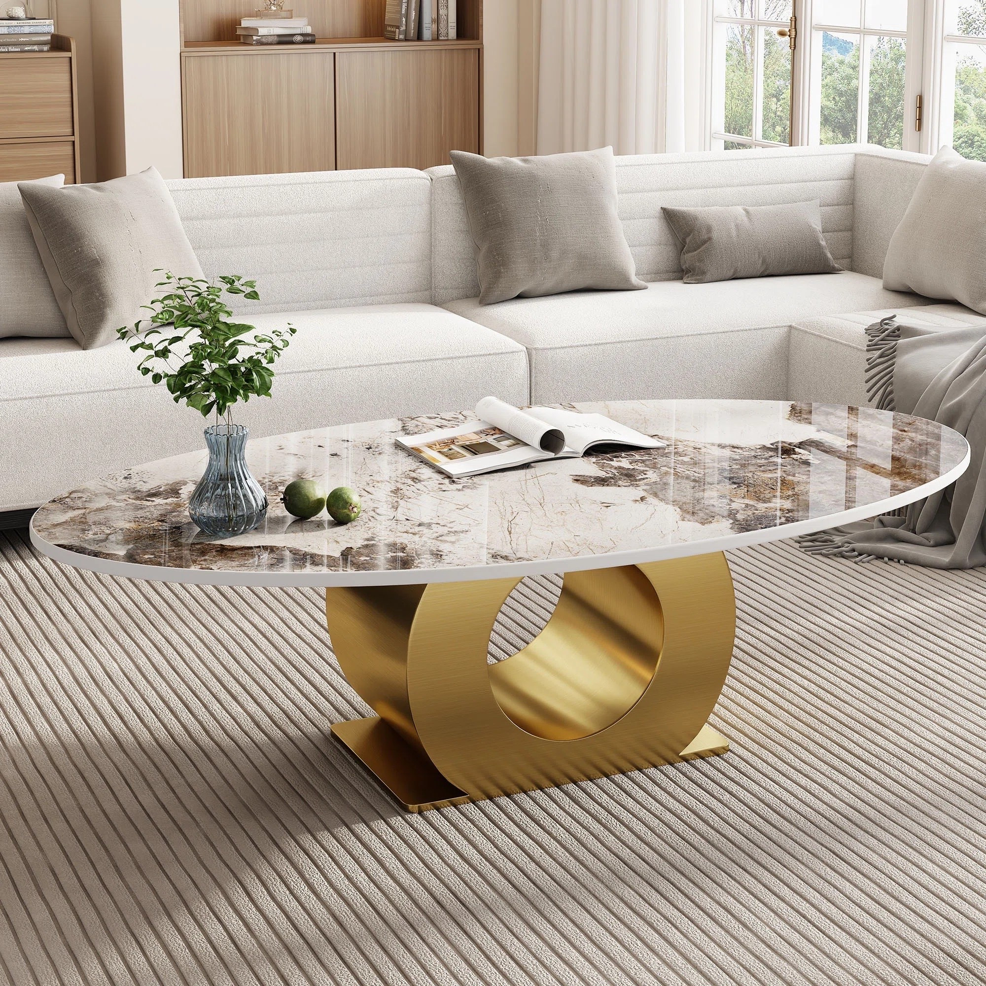 This modern oval coffee table features an artificial marble tabletop and a sleek contemporary design that adds an elegant focal point to living spaces. ON SALE and under $400.

Keywords:

* faux marble coffee table
* oval coffee table
* modern coffee table
* luxury coffee table
* artificial marble table
* living room centerpiece
* contemporary coffee table
* statement furniture
* sculptural furniture
* architectural design
* refined craftsmanship
* curved silhouette
* modern luxury furniture
* designer inspired decor
* polished finishes
* artful interiors
* modern luxury interior
* organic modern aesthetic
* sophisticated living room
* curated home decor
* elevated interiors
* contemporary elegance
* minimalist luxury
* gallery inspired home

#LTKSaleAlert #LTKSeasonal #LTKHome