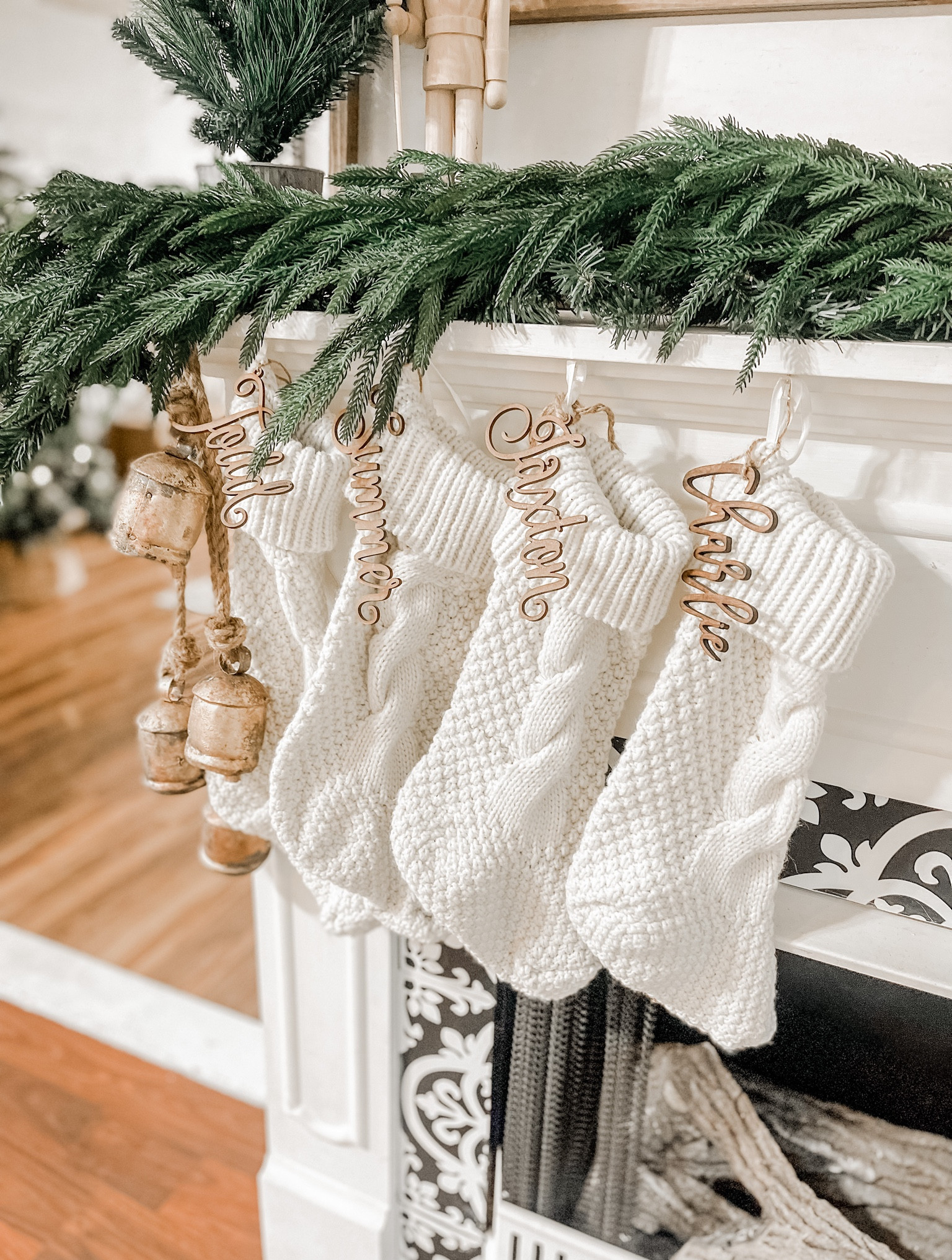 This real touch cedar garland is soooo good y’all!! 

#garland #stockings #nametags #christmasbells #bohochristmas 

#LTKunder50 #LTKSeasonal #LTKHoliday