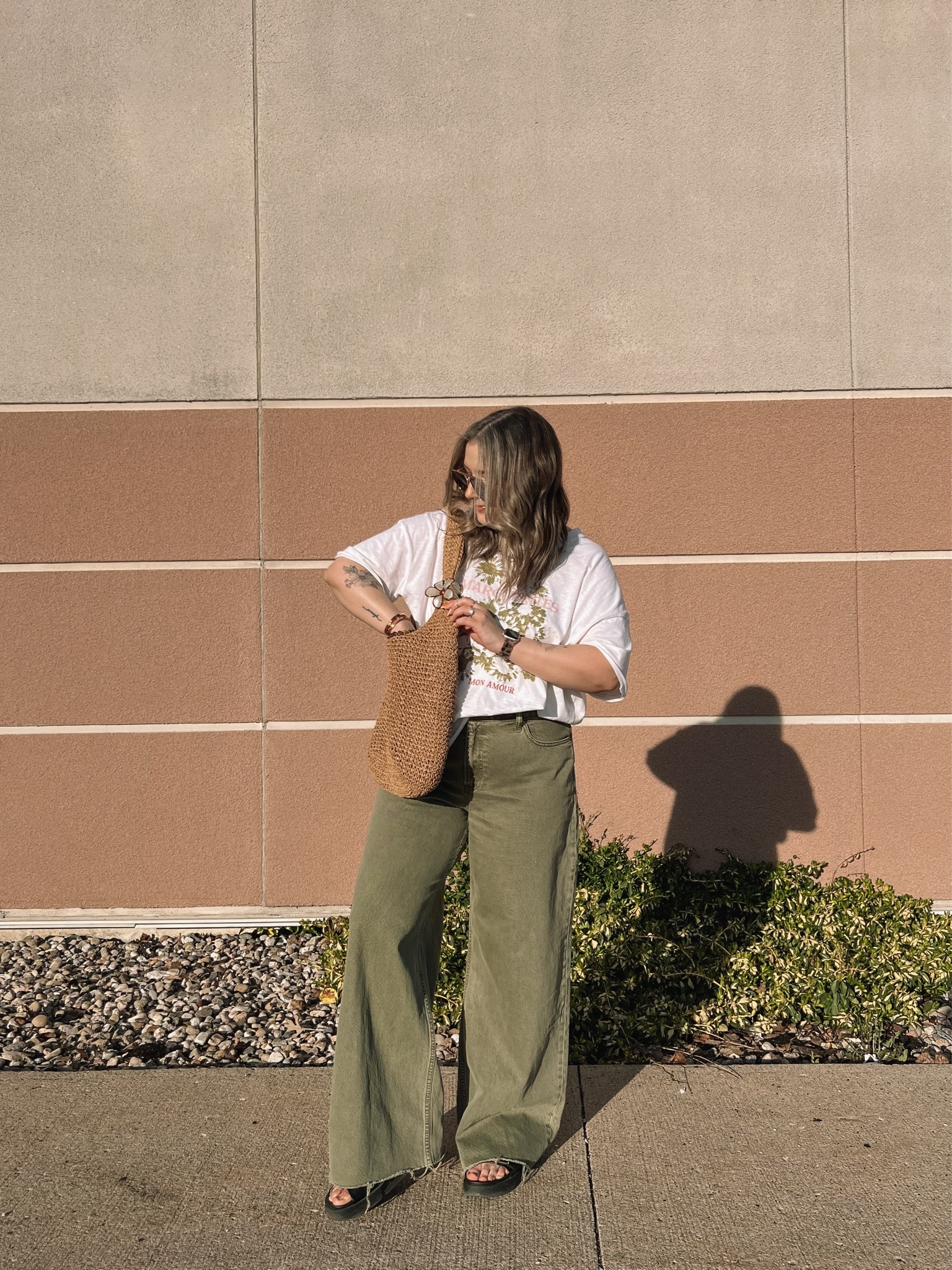 Casual spring outfit! Wearing L in the tee and 32 long in the jeans (I cut the hem for a custom length). Linked similar black sandals

#LTKmidsize #LTKjeans
