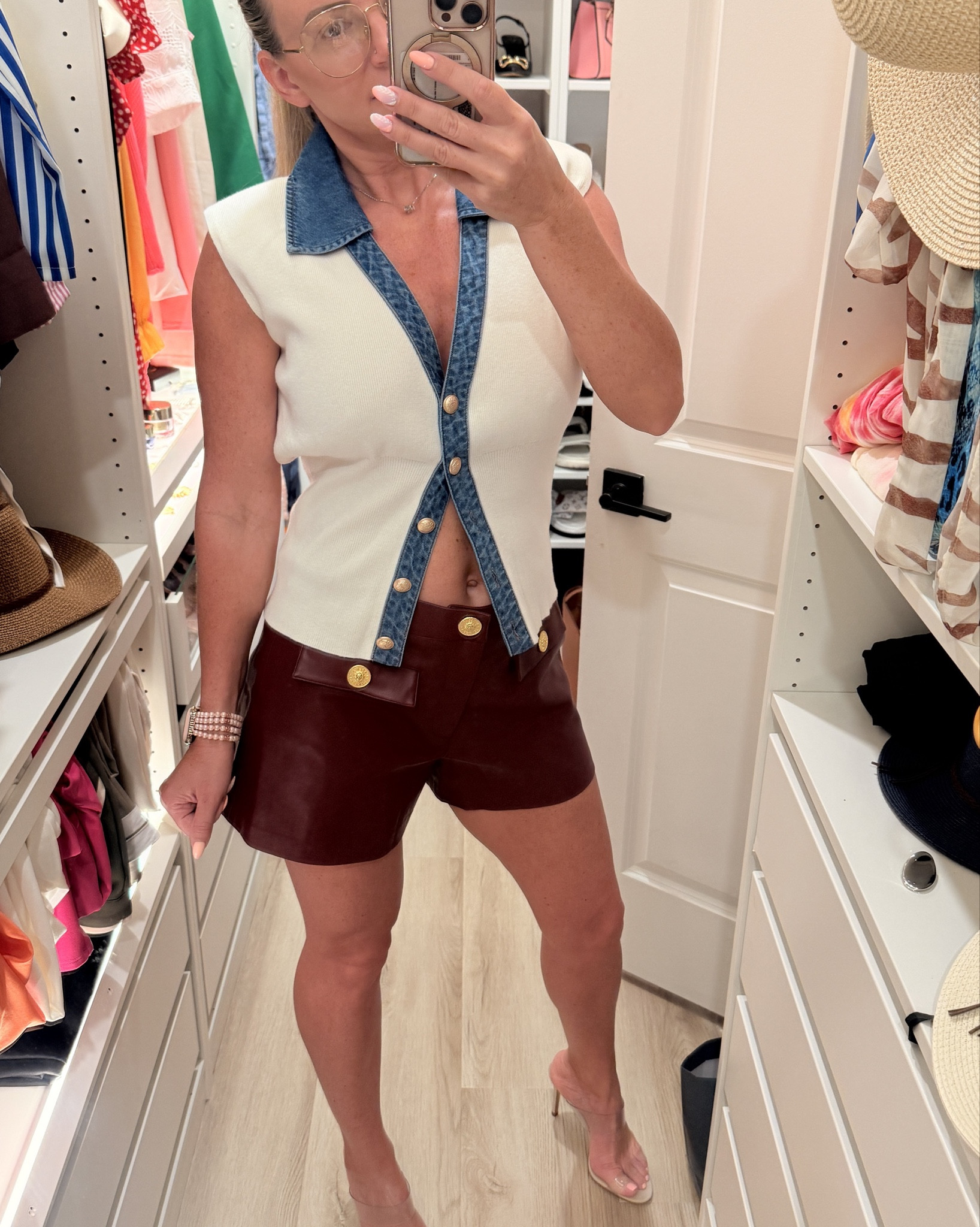 Burgundy leather shorts for this fall and winter. They have beautiful golden buttons. Runs big so size down. The top is cream sweater vest with blue jeans collar. Super cute. Has golden buttons as well and shoulder pads. Love this outfit. Pair with pumps or cream boots. 

#LTKgrwm #LTKStyleTip #LTKootd
