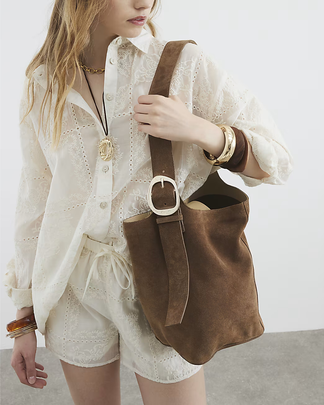 Brown Premium Large Suede Bucket Bag | River Island UK & IE