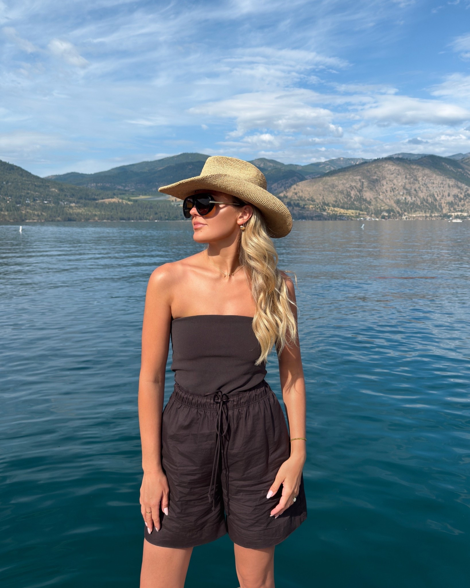 Brown linen blend shorts, bandeau top, straw cowboy hat. Summer lake fit. 

#LTKSeasonal #LTKSaleAlert #LTKOver40