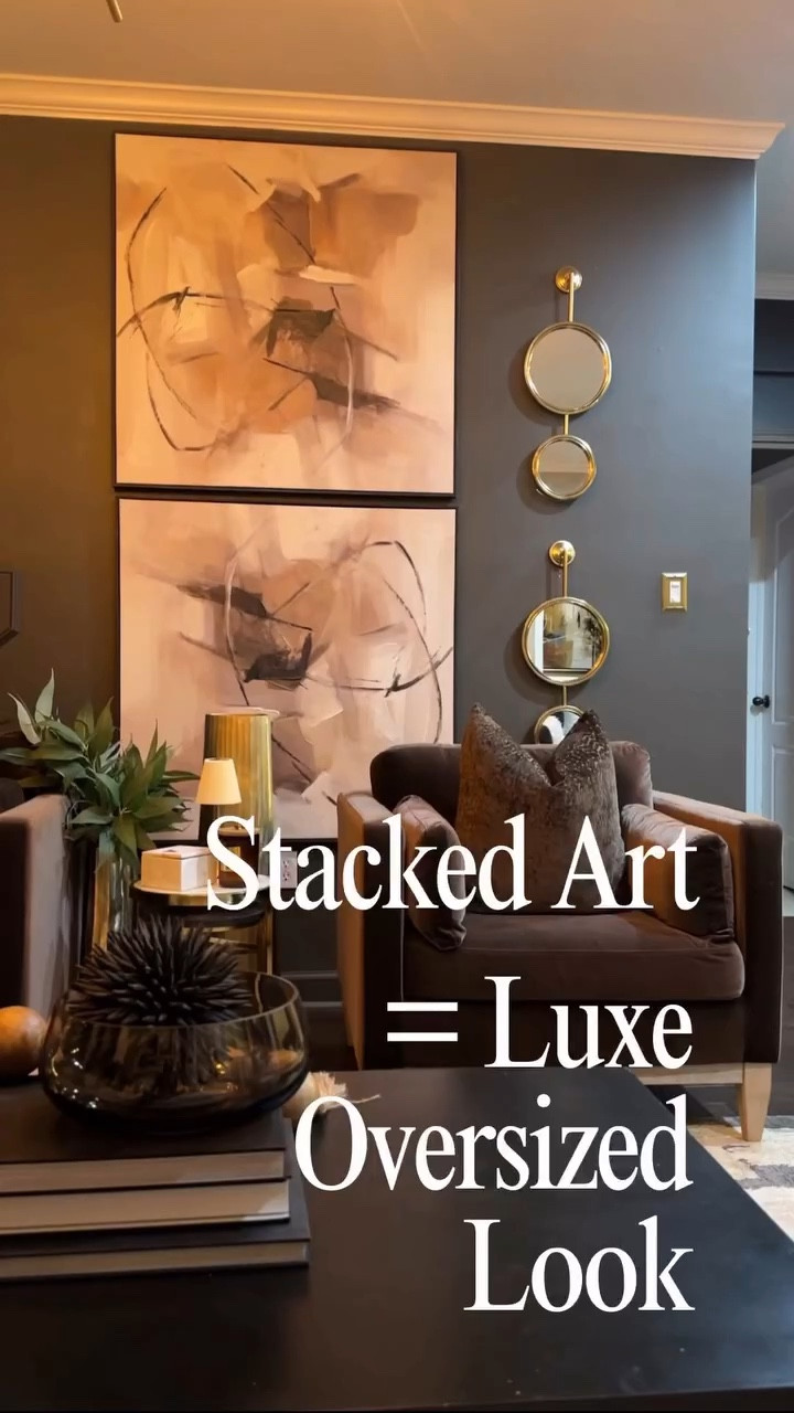 Double the art, double the impact 😳Instead of hunting for one oversized piece, stack two for a chic illusion of a grand statement wall. Who’s trying this?

#ModernGlam #TransitionalStyle #HomeDecorInspo
#WallArtDecor
#InteriorDesignIdeas #HomeStyling #DecorTips #ElevatedLiving #UniquedBySherita #homegoods