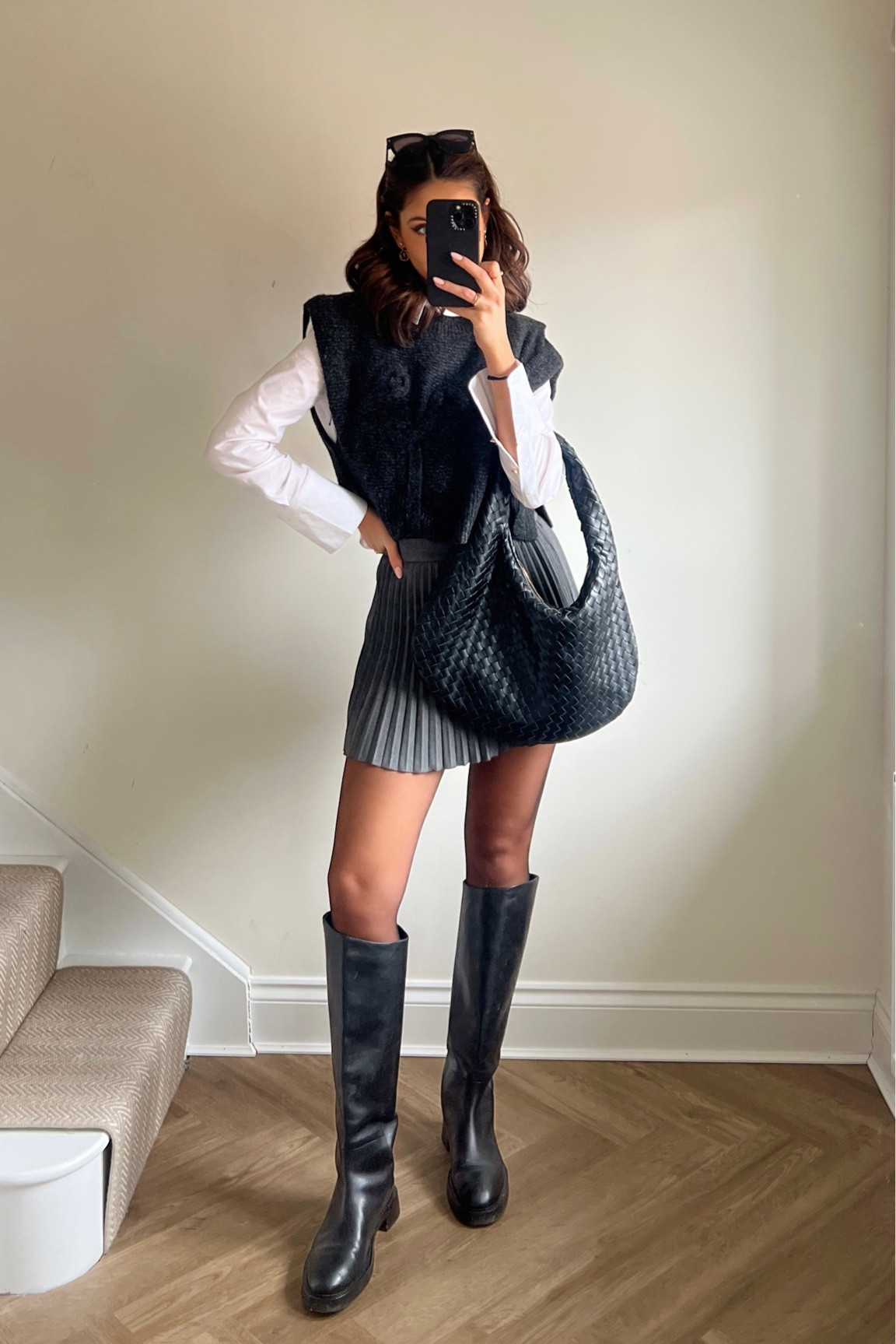 Classic Poplin White Shirt styled with a Black Jumper Sweater Vest, Mini Leather Pleated Skirt, Knee High Black Leather Flat Boots and Black Shoulder Bag 🖤

#LTKworkwear #LTKSeasonal #LTKstyletip