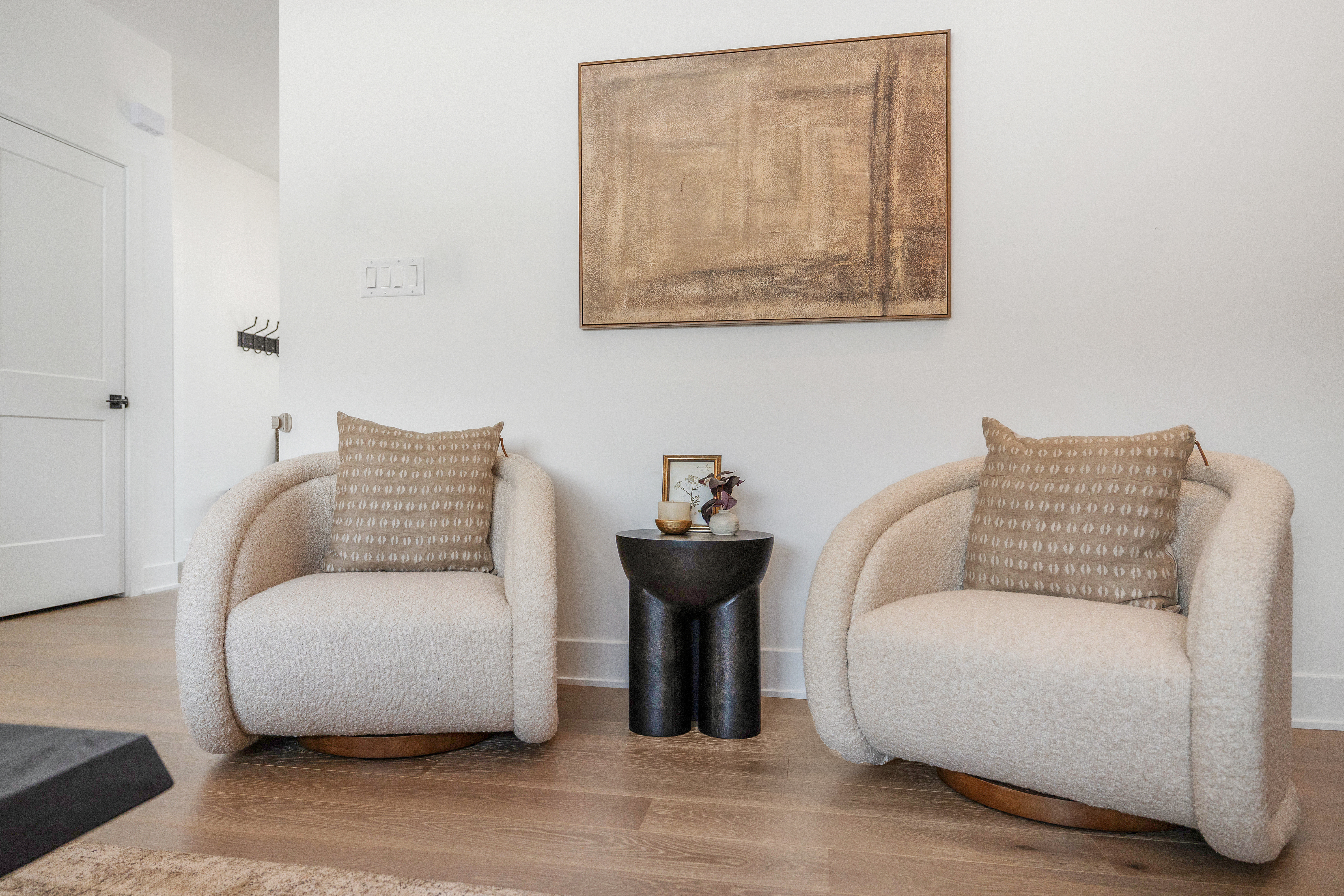 Seating with character, these Crate and Barrel chairs add the perfect amount of character to a neutral living room design. A unique shape, textured fabric, and a swivel feature that make them a comfortable addition to any room. 

 #LTKHome