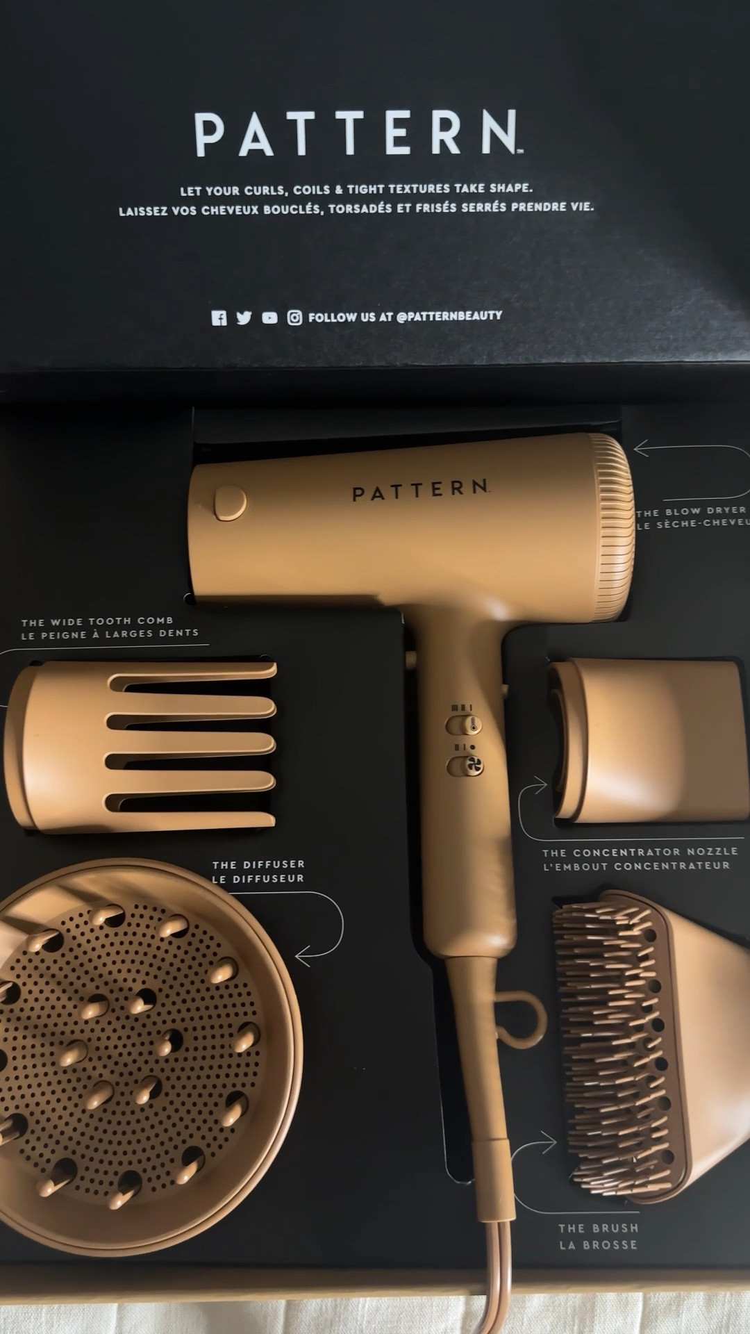 Finally a blow dryer for US 💛 Pattern Blow Dryer caters to all the curlies, coilies, and tight textures. This high performing blow dryer has an AC motor that reduces dry time and an ion generator to enhance natural curls. 

What I love about this dryer from just unboxing is that it comes with 4 attachments designed with curly hair in mind. I’m counting down the days until wash day so I can put this dryer to the test! 

Attachments: 
-Diffuser 
-Wide tooth comb
-Brush
-Concentrator nozzle 


#LTKbeauty #LTKGiftGuide #LTKstyletip