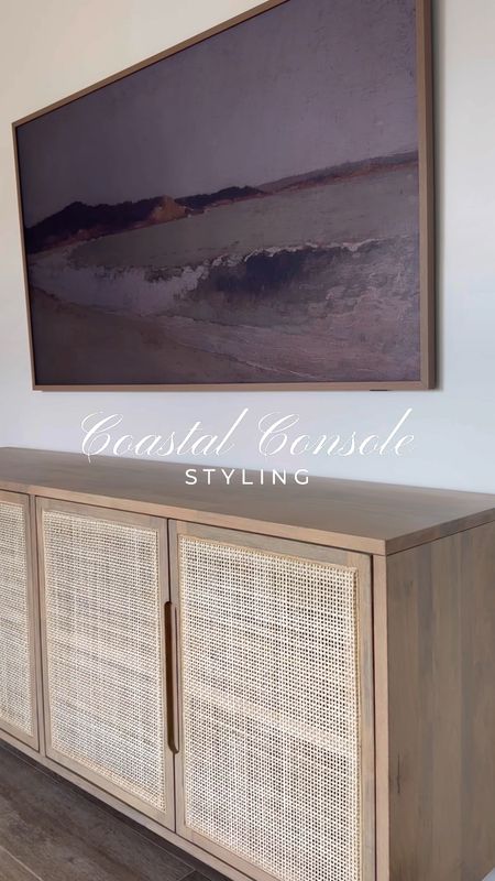 Coastal Console styling with @kathykuohome #ad 🤍 This stunning cane sideboard is the perfect addition to the beach house. It offers so much storage and creates a focal point with its beautiful wood tone & cane details. Sharing some of my other coastal favorites from Kathy Kuo Home on my story now + a new light fixture I also ordered for the house.

#lovewhereyoulive #ltkhome #coastaldecor #likekit #beachhouse #canesideboard



#LTKHome #LTKStyleTip #LTKSeasonal