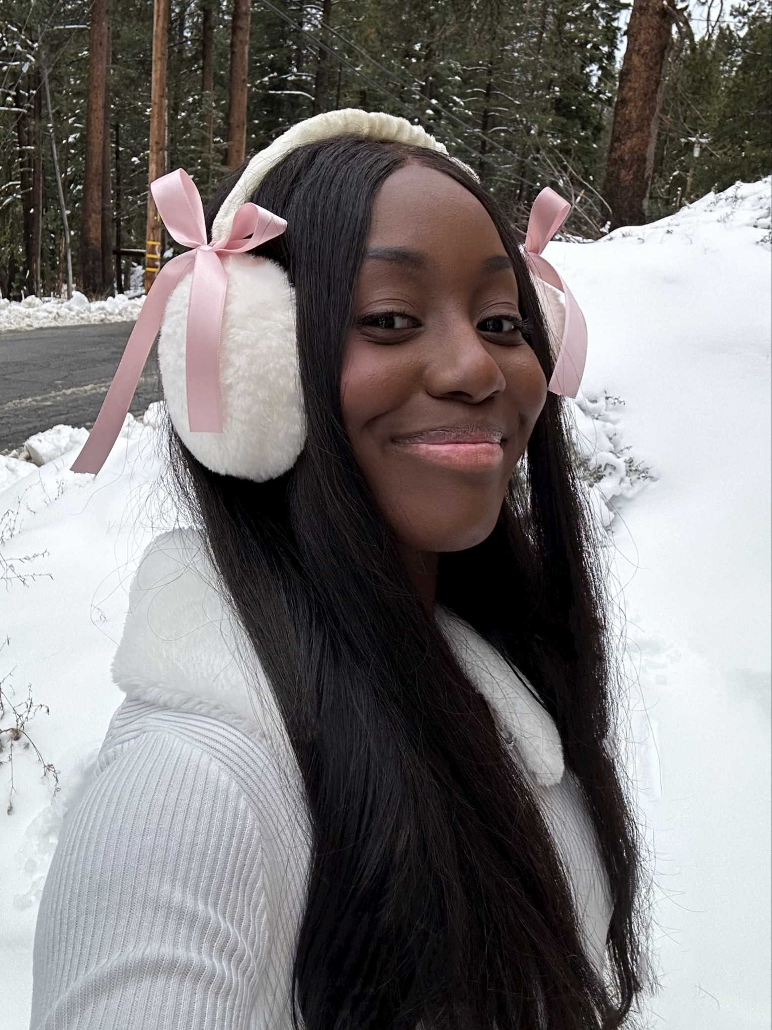 wishing you the merriest🎀🌲🤍 wearing white fur earmuffs from amazon  with ribbon tied on them and a white fur trimmed cardigan from edikted

#LTKSeasonal