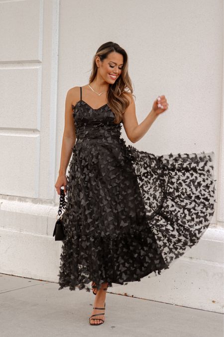 Stunning black butterfly dress 



#LTKSeasonal #LTKunder100 #LTKstyletip