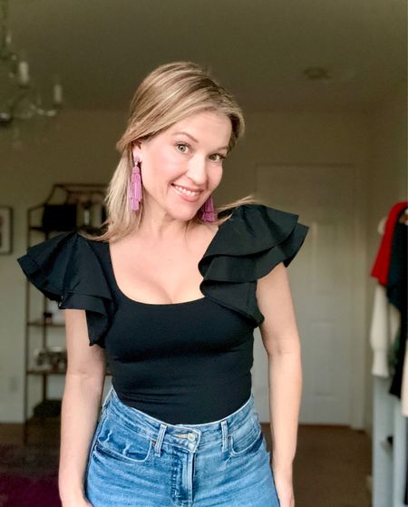Sometimes adding a pop of pink in some fun jewelry can elevate a simple black top to another degree! Love that! 

#LTKstyletip #LTKfindsunder50 #LTKfindsunder100