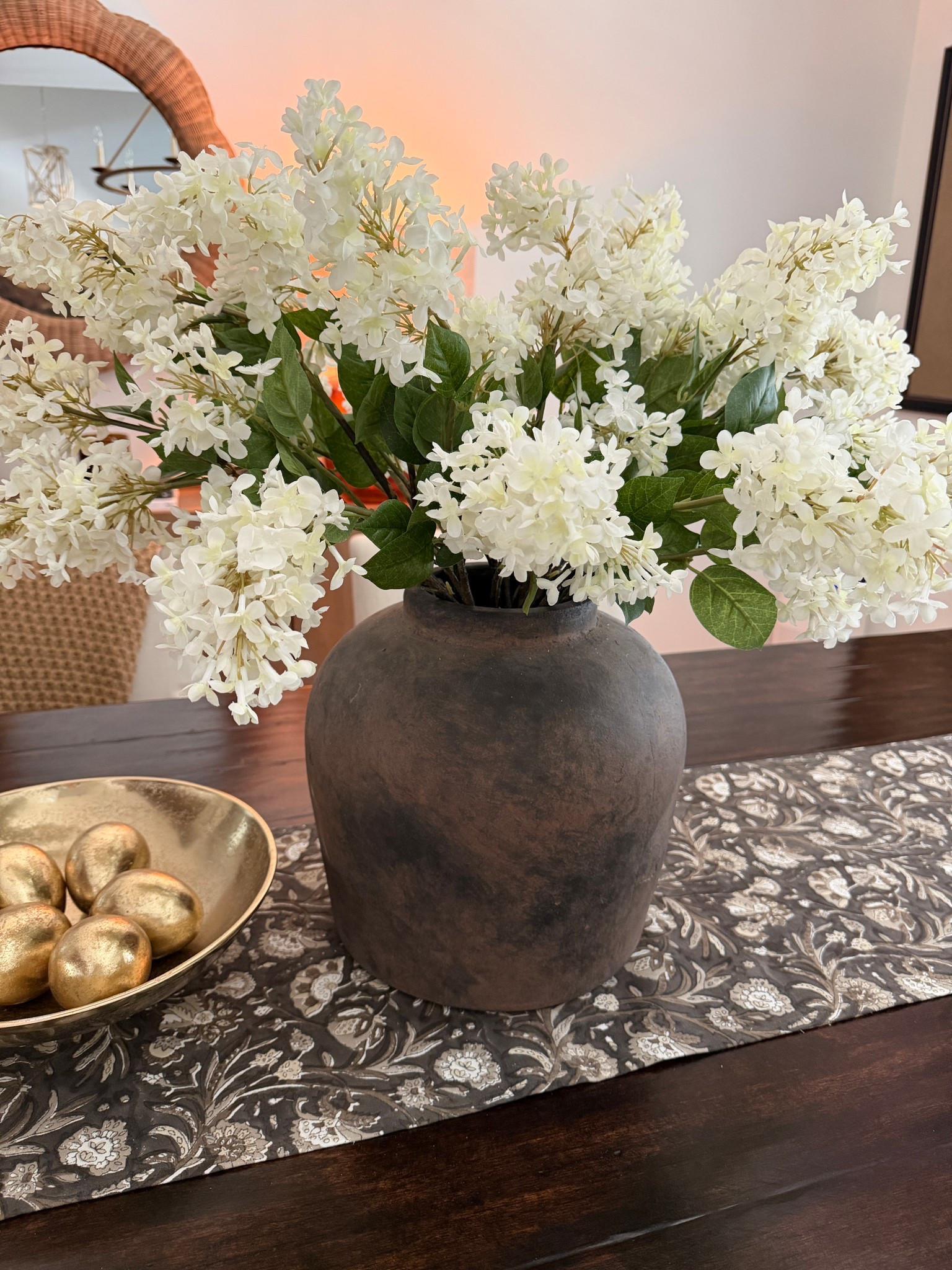 Here is how I styled my main dining table. You don’t always have to add a tray. When you style without a tray, I would suggest one large focal piece and then just one smaller accent piece  Too much can look cluttered and not intentionally styled. 