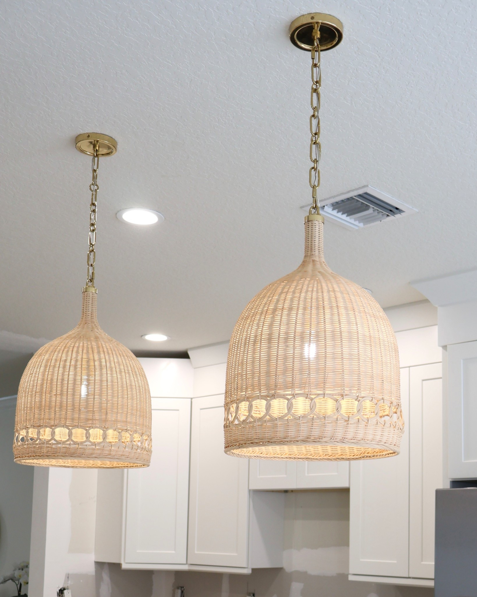 Our new Wyecreek Bell Rattan Pendant lights from Serena & Lily are now 40% off! I’ve linked similar styles below 💡✨

Perfect coastal kitchen lighting moment 🤍 these woven rattan pendants bring in so much texture, whimsical, light airy coastal vibe. Paired with our new white cabinets + brass accents, it’s giving modern coastal meets organic neutral home.

If you’ve been searching for Serena & Lily lighting, coastal pendant lights, wicker lighting for kitchen islands, or high-end coastal decor on sale, this is such a good deal to elevate your space ✨

#LTKSaleAlert #LTKHome