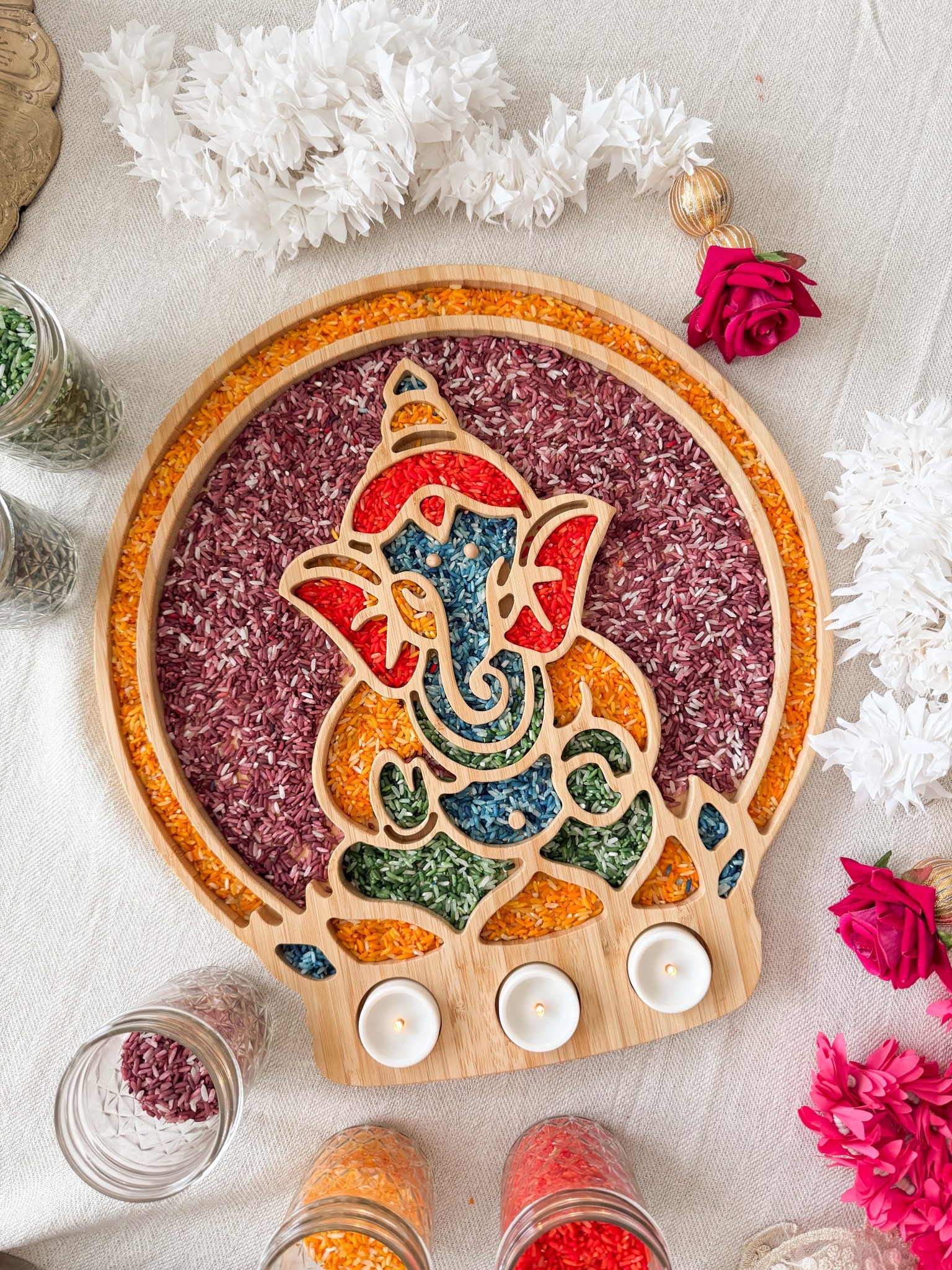 DIWALI RANGOLI: Jewel-Toned Colored Rice — Make your Rangoli shine bright with these DIY colored rice tips! Follow these simple steps and get the perfect color every time! 

You’ll Need:
- 1 cup uncooked rice
- Food coloring (red, yellow, blue)
- 1 tbsp vinegar (optional, but helps set color)
- Plastic bags
- Parchment paper

Wooden Rangoli: @bhaashabasics
.
.
.
#rangoliDIY #diwalidecor #coloredrice #diwaliprep #rangolidesigns #diwalicelebrations #artsandcraftsforkids #diwalicrafts #diwalicraftsforkids #rangoliart #diwalitraditions #diydiwali #diwalitutorial #sensorybins #sensoryplay Diwali Decorations | Home Decor Inspo | DIY Crafts | Wooden Rangoli | Colored Rice | How To | Tutorials | Arts & Crafts | Sensory Play | Rangoli

#LTKFamily #LTKSeasonal #LTKKids