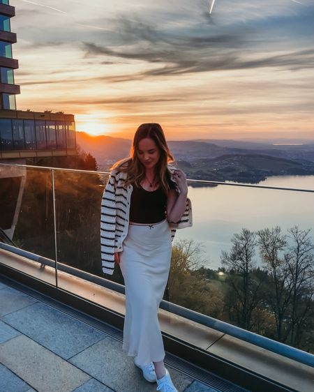 Switzerland requires layered outfits because the weather changes often but theirs nothing like these mountain top views pre-dinner! This silk skirt was from Zara but I linked a similar option. Such a good staple piece. 

Travel Outfit | Vacation Outfit | Vejas | Anthropologie | Europe Style | Switzerland Outfits 

#LTKTravel #LTKShoeCrush