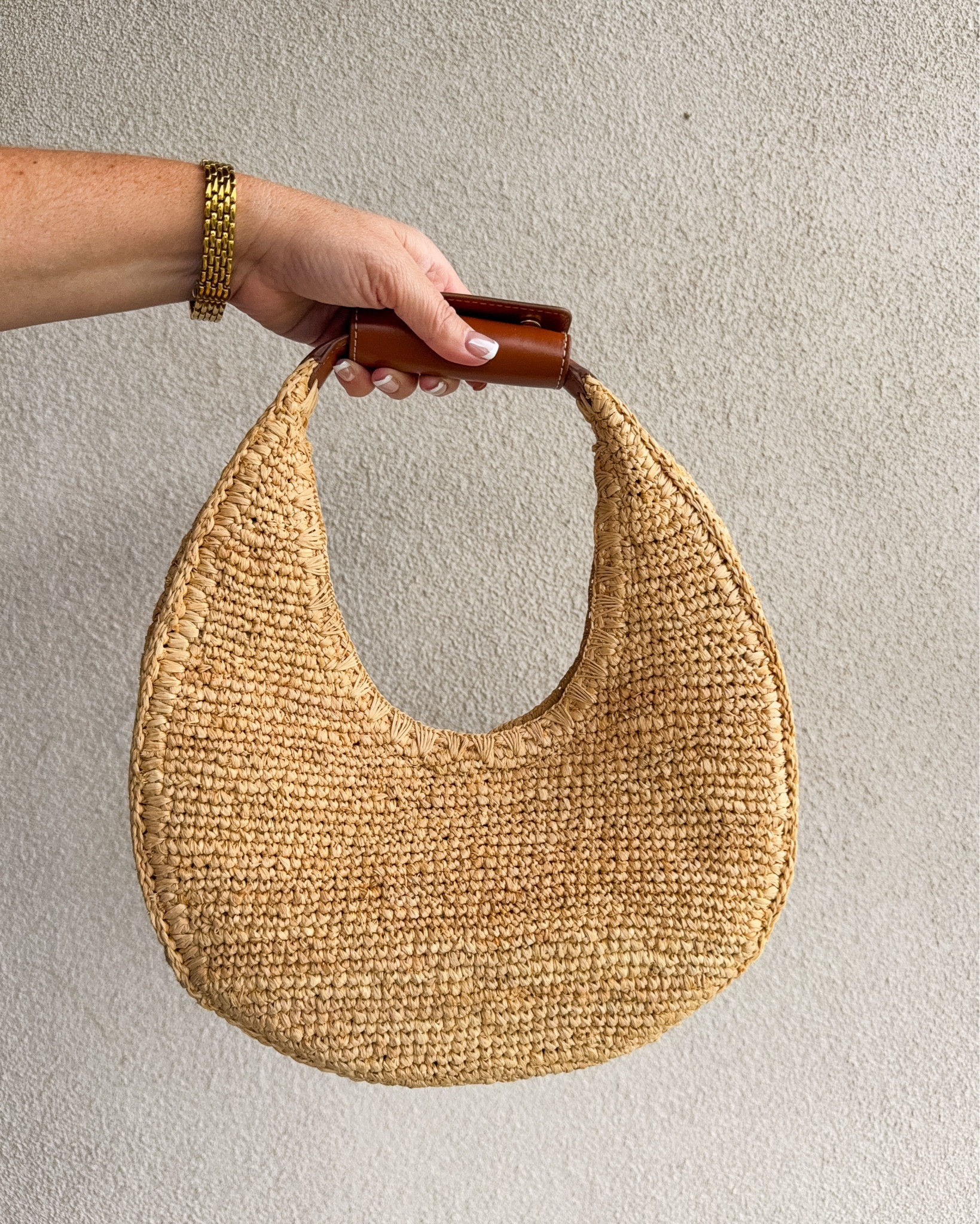 I love the structure of this STAUD Women's Raffia Moon Tote Bag and was excited to find this gorgeous piece on Amazon!  The circular shape and woven raffia is not to large but still have plenty of room to hold all the date night essentials!

#LTKootd #LTKSeasonal #LTKTravel