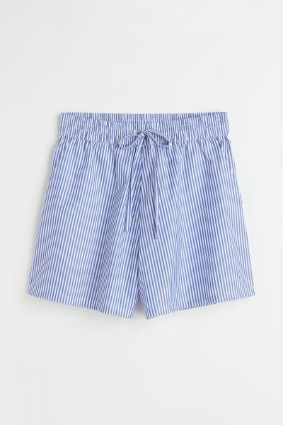 Short shorts in a cotton weave. High waist with covered elastication and a drawstring.SizeThe mod... | H&M (UK, MY, IN, SG, PH, TW, HK)