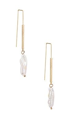 petit moments Sitting Pretty Earrings in Gold from Revolve.com | Revolve Clothing (Global)