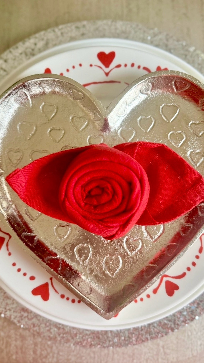 A simple but stunning Valentine centerpiece 🤍✨ This silver heart tray is dressed up with a bold red fabric rose for an easy, elegant look that feels festive without being overdone. Perfect for coffee tables, entryways, or a sweet Valentine’s Day accent you can reuse year after year.

#LTKSeasonal #LTKHome #LTKDecor #ValentinesDecor #ValentinesHome #HeartDecor #TabletopDecor #SimpleDecor #HolidayDecor #LoveAtHome

#LTKHome #LTKSeasonal