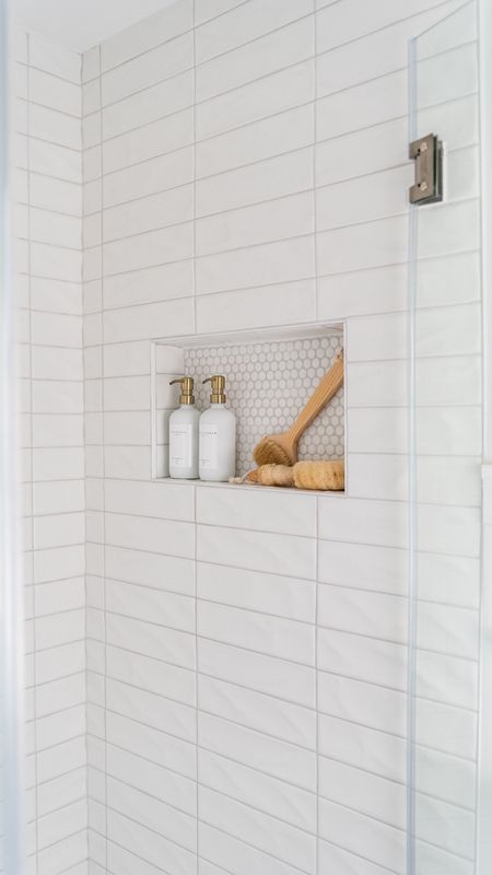 Upgrade your bathroom with white subway tile, decorative tiles, new glass door and bathroom accessories, coastal style home decor

#LTKhome #LTKfamily