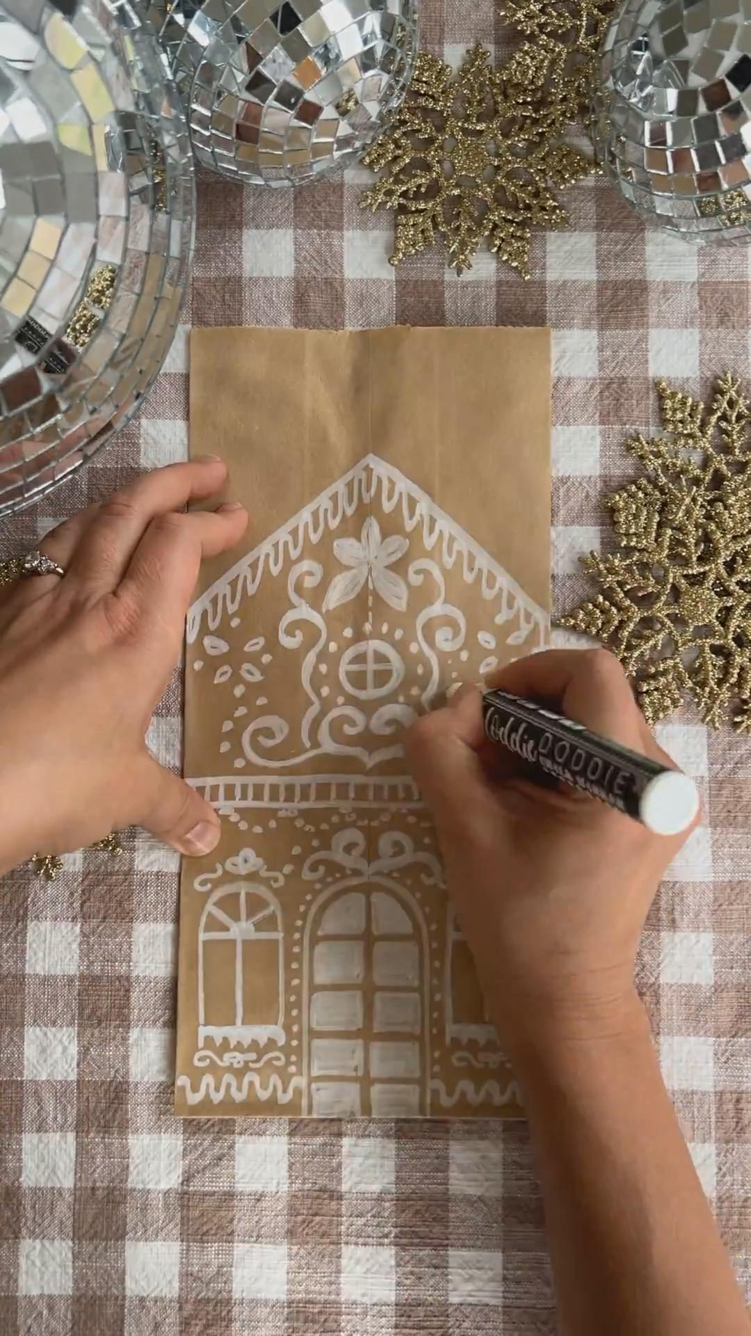 DIY gingerbread house gift bags are the easiest and coziest holiday craft — and such a fun Christmas activity to do with kids. All you need are brown kraft paper bags and a white paint pen to create the sweetest handmade gift wrap for cookies, teacher presents, or small holiday gifts. It’s a budget-friendly, meaningful way to slow down and add a personal touch to your Christmas gifting. Everything’s linked in LTK — from my favorite chalk paint markers and inexpensive paper bags to the festive holiday wrapping essentials I’m using this season. A simple, beautiful way to make the holidays feel magical and handmade. ✨


#LTKHome #LTKSaleAlert #LTKSeasonal