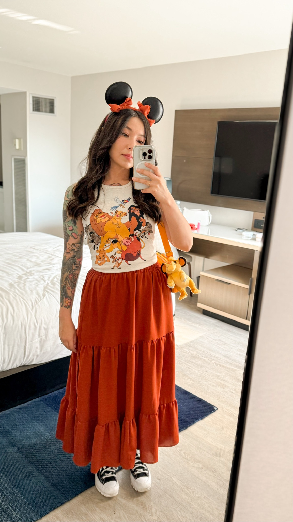 Lion King Disney outfit with a maxi skirt, graphic tank top and ribbon ears 🦁🎀  The top is a kids tank top- I’m about 5’3” and am wearing a kids size Large!



#LTKStyleTip #LTKTravel #LTKSeasonal