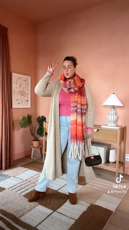 Winter OOTD | Day 5

This scarf is the ultimate cozy vibe & would make the perfect gift too! I sized up in these jeans, wearing the 33! Linking similar cardigans since mine is old!

#LTKcurves #LTKstyletip #LTKSeasonal