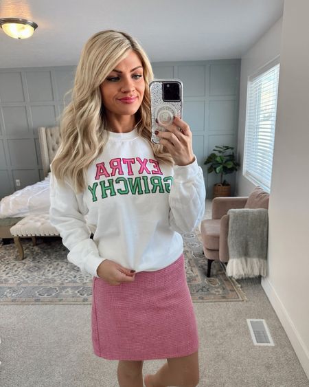 Cozy & cute holiday outfit! Wearing this Extra Grinchy sweatshirt under $34 on Etsy! Paired it with a pink skirt. 

#LTKunder50 #LTKunder100 #LTKHoliday