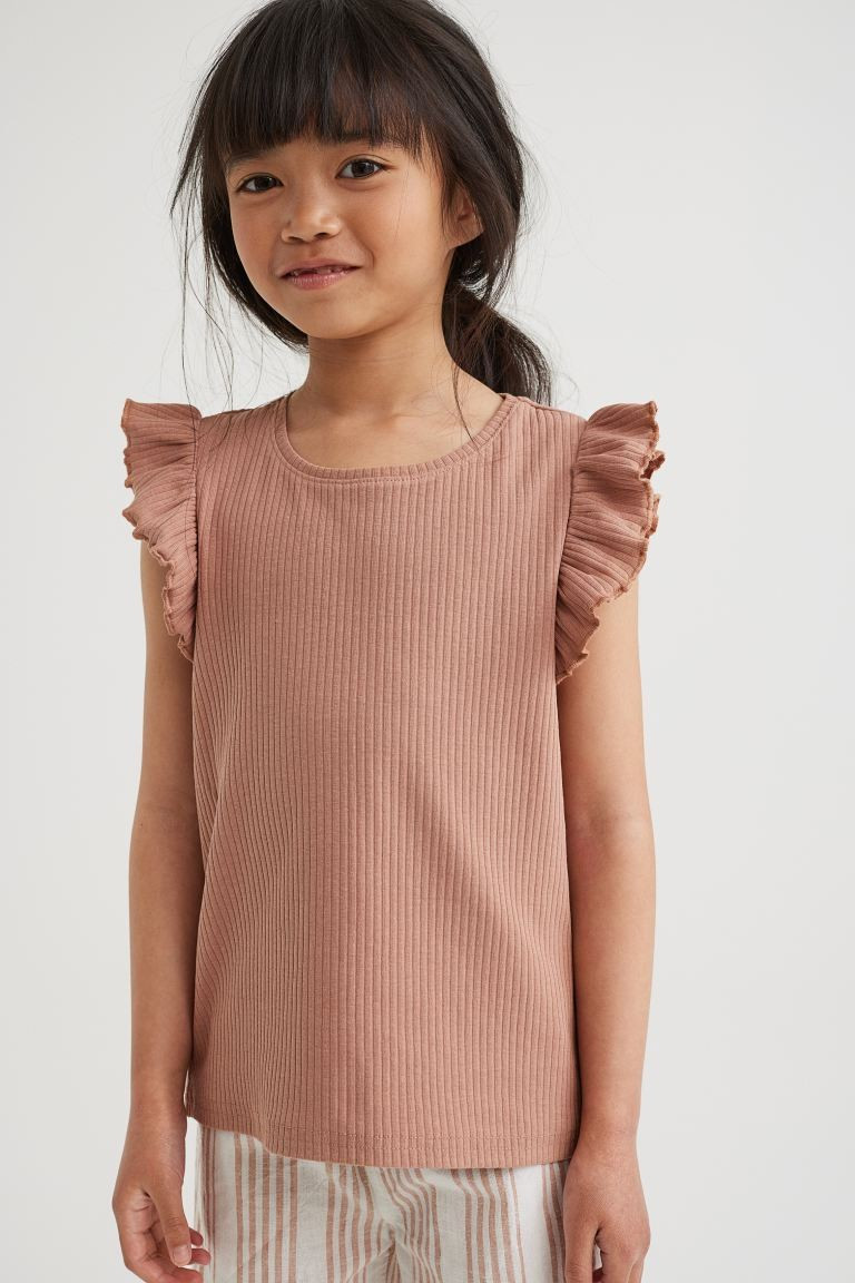 Conscious choice  Sleeveless top in soft, ribbed cotton jersey. Overlocked, flounced trim at shou... | H&M (US + CA)