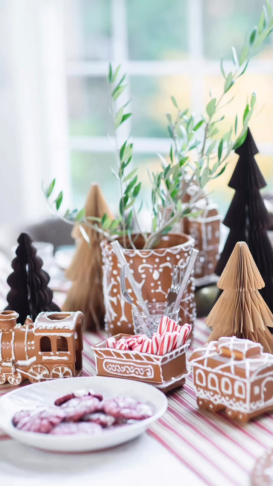 Gingerbread Christmas table, but make it high-end and homemade. Most of this table was DIY, thrifted, or a look-for-less, including the gingerbread houses made from thrifted villages and the reusable clay “cookies” that look real. I’ve linked similar pieces and affordable look-alikes so you can recreate this entire table without the designer price tag.


#LTKSeasonal #LTKHome #LTKHoliday