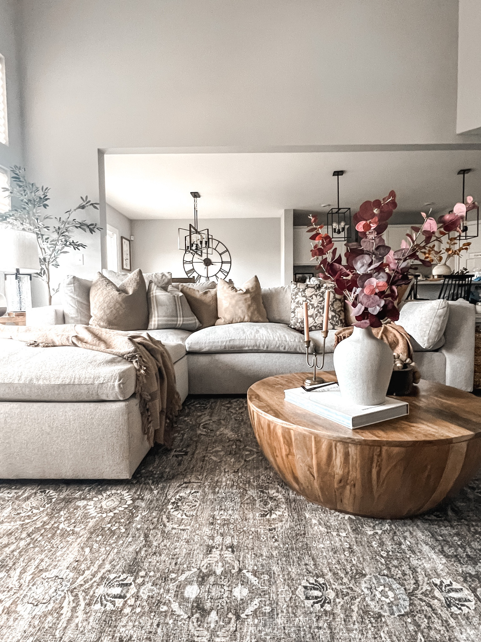 Cozy living room space

Living Room Decor | Seasonal Decor |Sofa Sectional | Round Mango Wood Coffee Table | Throw Pillows | Throw Blankets | Faux Florals | Fall Florals |Coffee Table Decor | Candle Holder | Neutral Decor | Loloi Rug