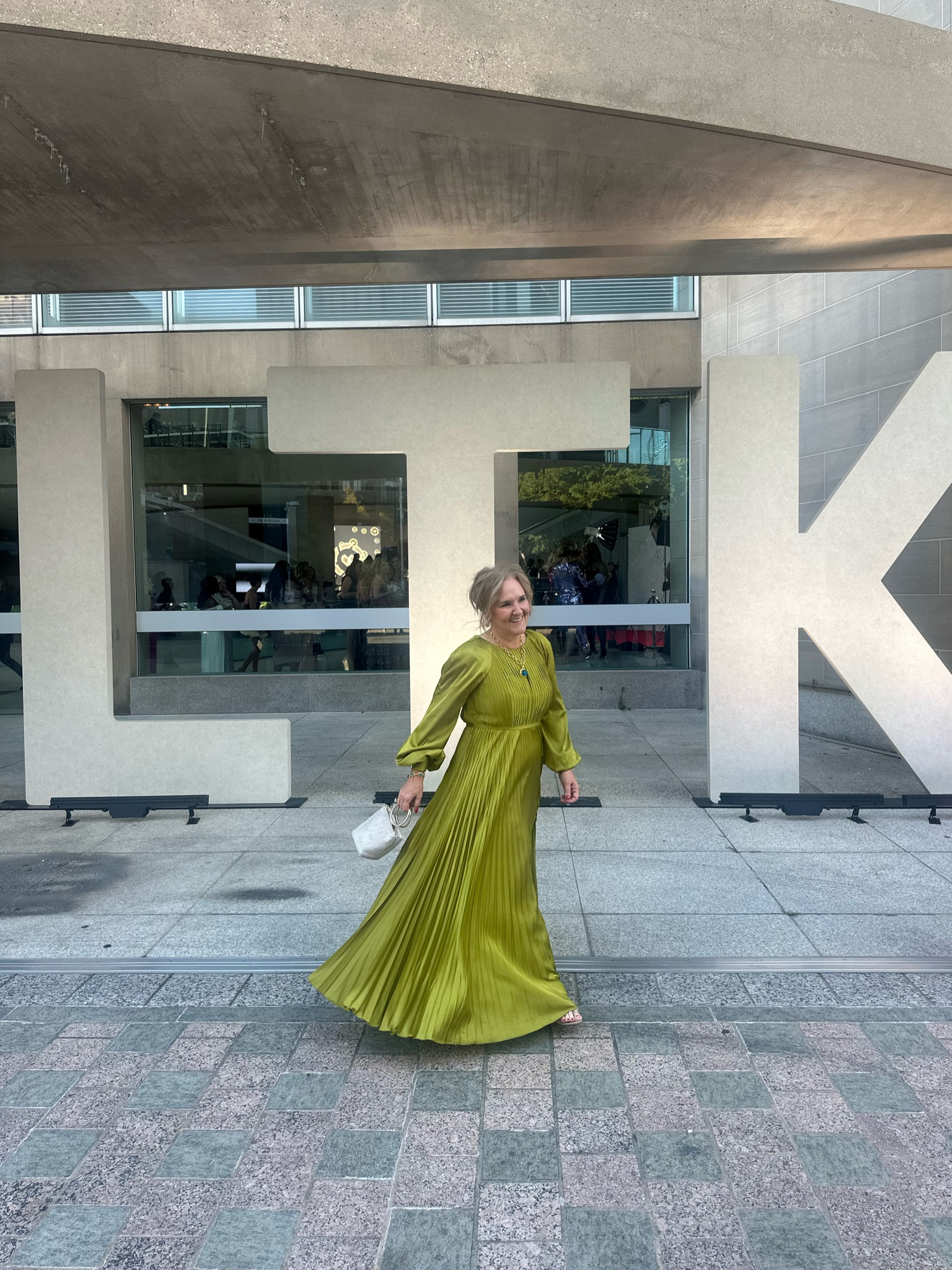 Love that I can wear my MacDougall mother of the bride dress a second time. I absolutely loved it and feel amazing. It has beautiful movement and the color is just stunning. It also comes in other colors if this chartreuse green is not for you.
I am wearing a size 10, and it is true two size 

Macdougal  red carpet, gala dress awards night, formal wedding mother of the bride mother of the groom 