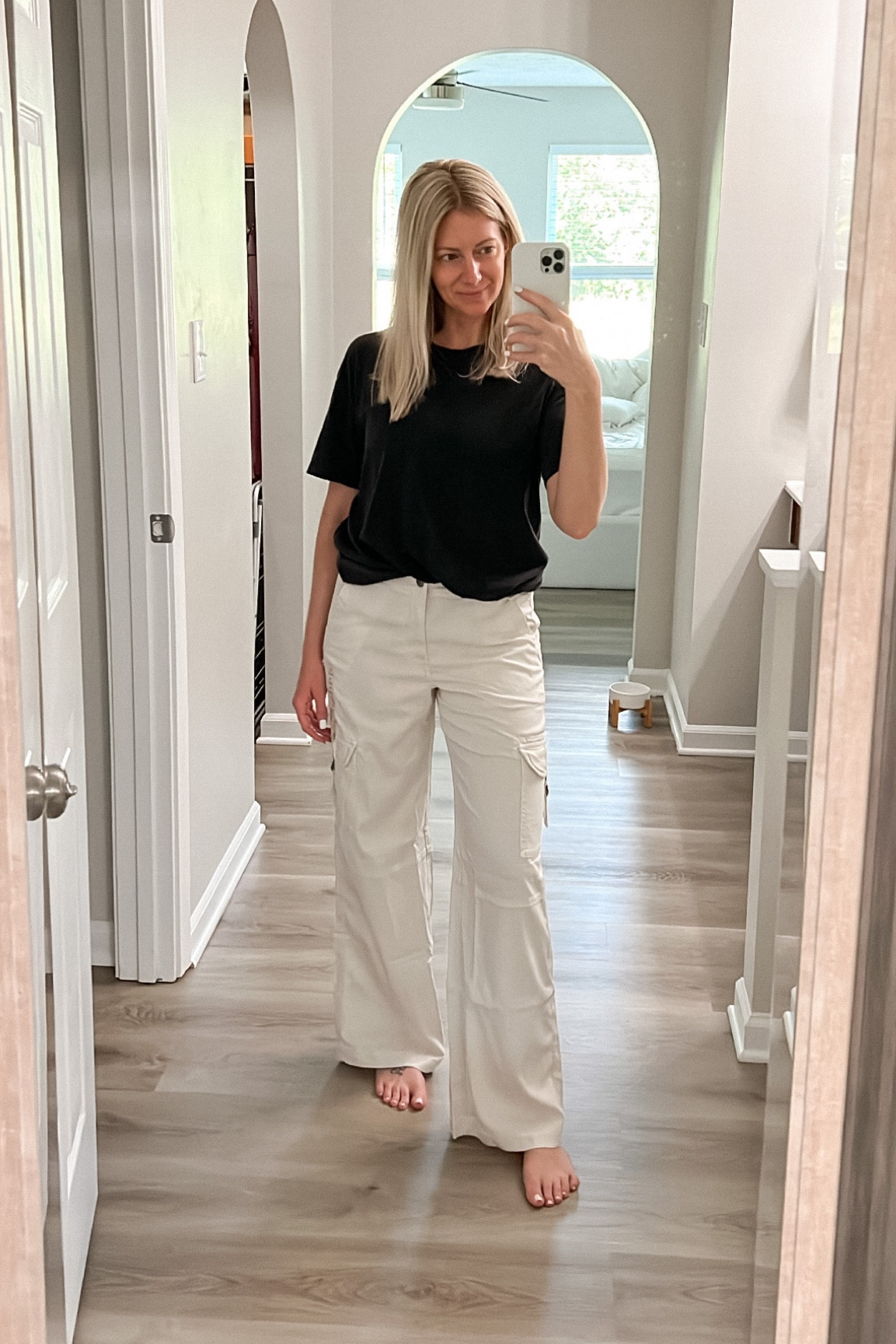 Both are on sale! Oversized tee size only $10. Off white baggy cargo pants - wearing size 4. Could size down because the waist is stretchy, but I like them looser. #LTKfit

#LTKunder50 #LTKsalealert #LTKstyletip