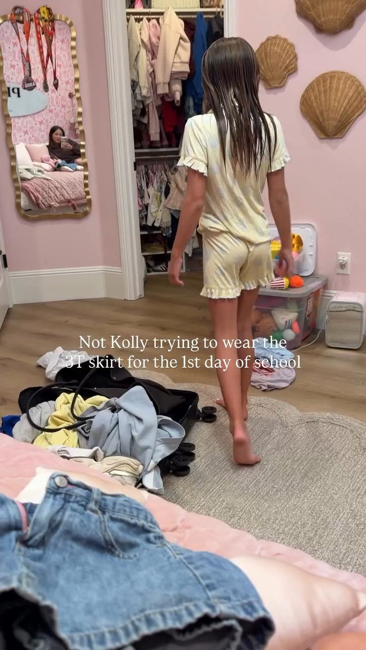 Not Kolly trying to wear the 
3T skirt for the 1st day of school