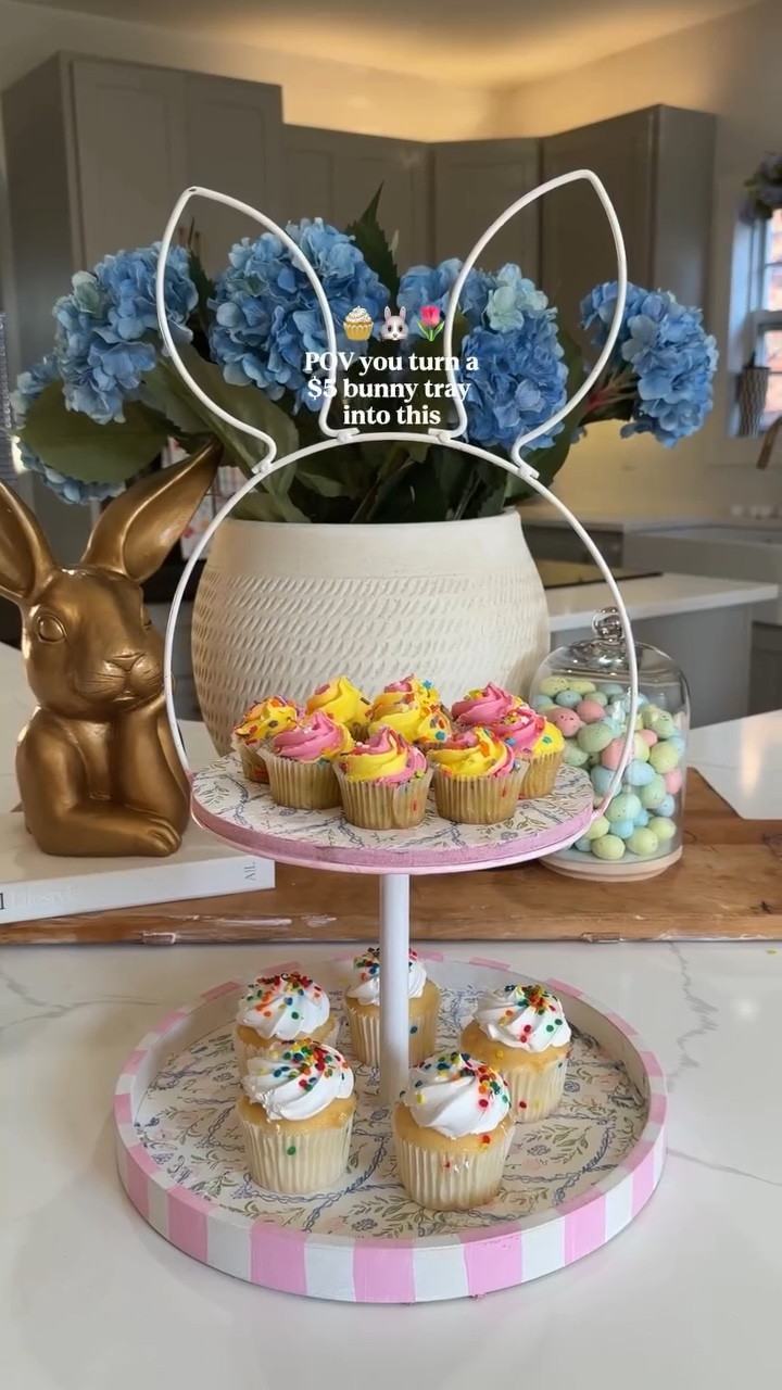 If you’re hosting for Easter this is such a cute party decor hack 🐰🧁🌷 $5 tray turned into a tiered cake stand!! Can be used for appetizers, deviled eggs, dessert, etc. 

Follow @kimberlyj_king for more easy crafts
Comment CAKE for links *be sure you’re following so the DM goes through 

#homedecor #easterdecor #spring #easydiy #craftideas easter spring craft diy home hosting party hack brunch decor