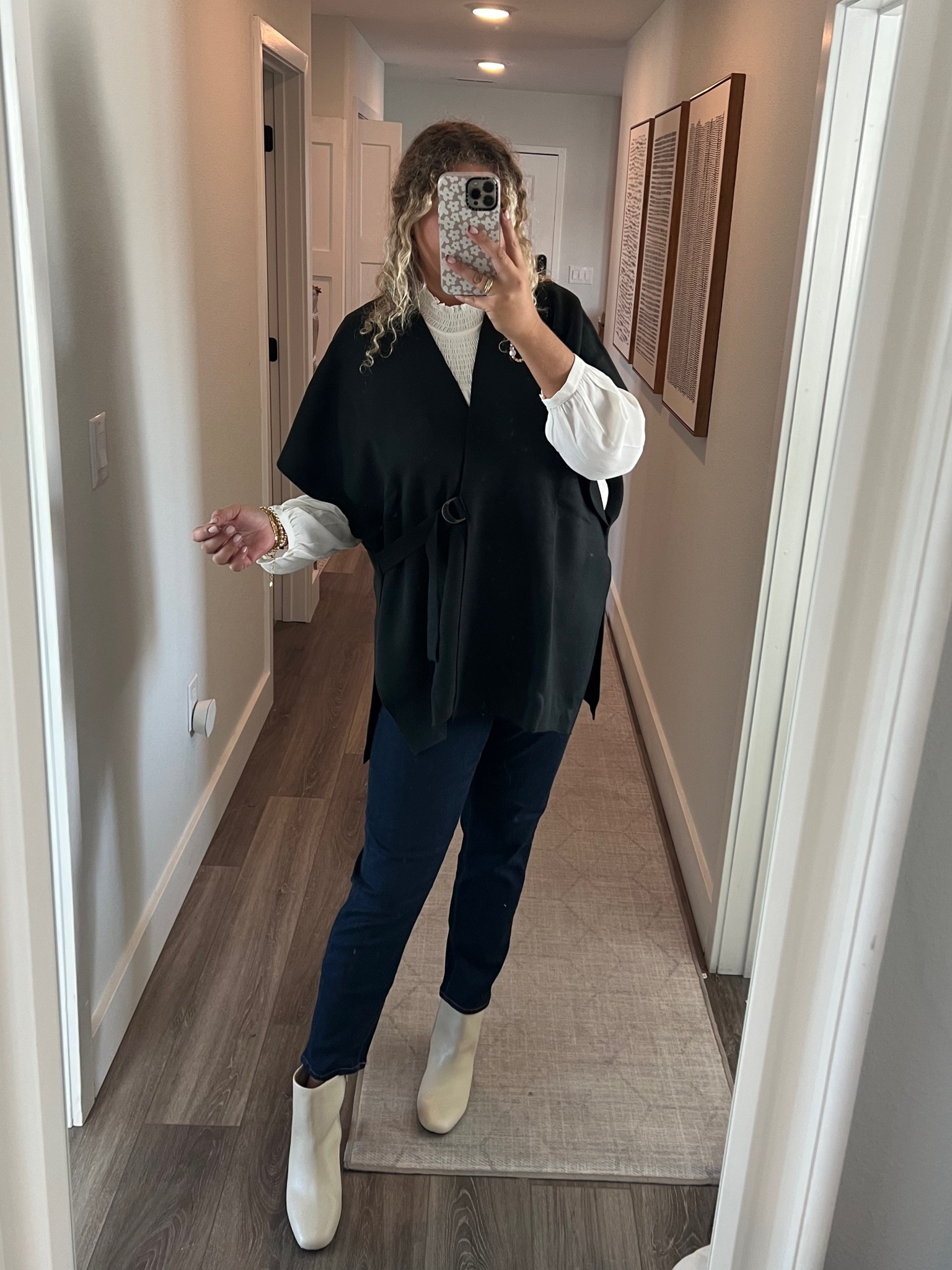 Love this outfit for a dressed up, but comfortable Thanksgiving outfit or a more casual outfit for work. I put this together with some denim jeans but you could definitely change with some tailored pants for the office! 

Fall outfit, wrap vest, workwear, denim jean pants, white booties, midsize outfit 

#LTKworkwear #LTKmidsize #LTKshoecrush