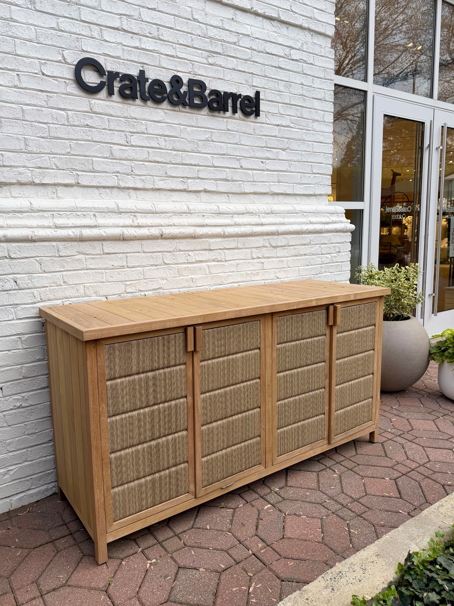 Outdoor storage, but make it beautiful! 🤎  The Bali 62” Indoor/Outdoor Storage Credenza from Crate & Barrel blends solid teak and all-weather wicker for a relaxed, resort-inspired look. 🌿 Inside, spacious cabinets and shelving keep patio essentials neatly tucked away while the slatted design helps with drainage and ventilation.   🙌🏻 A stylish piece from the Bali outdoor collection—and it’s currently on sale. Linked more patio and deck storage options! 🌤️ #crateandbarrel #outdoorstorage #outdoorfurniture

#LTKHome #LTKSeasonal #LTKSaleAlert